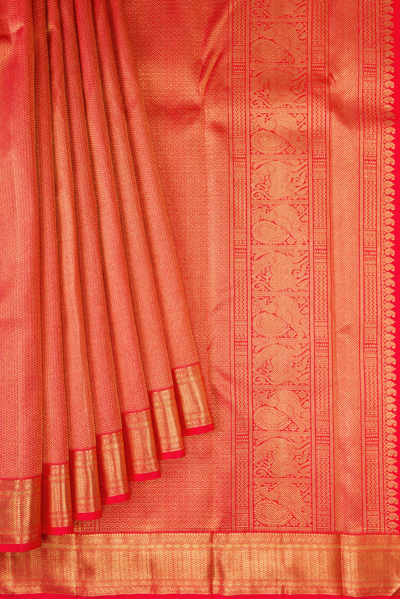 Pleats and pallu of Pure Silk Pure Zari Red Dual Tone Kanjivaram Saree with Zari Brocade on the body and Zari Border. 