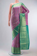 Lavender Kanchipuram Silk Saree with Jacquard design on the body and Zari Border displayed on a mannequin