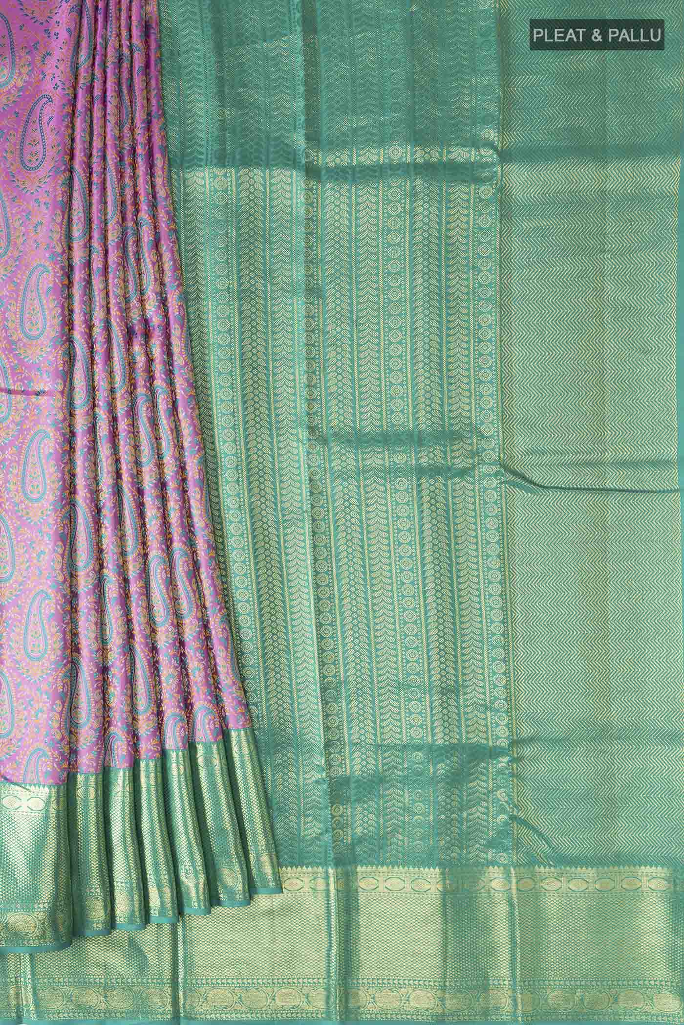 Pleats and pallu of Lavender Kanchipuram Silk Saree with Jacquard design on the body and Zari Border