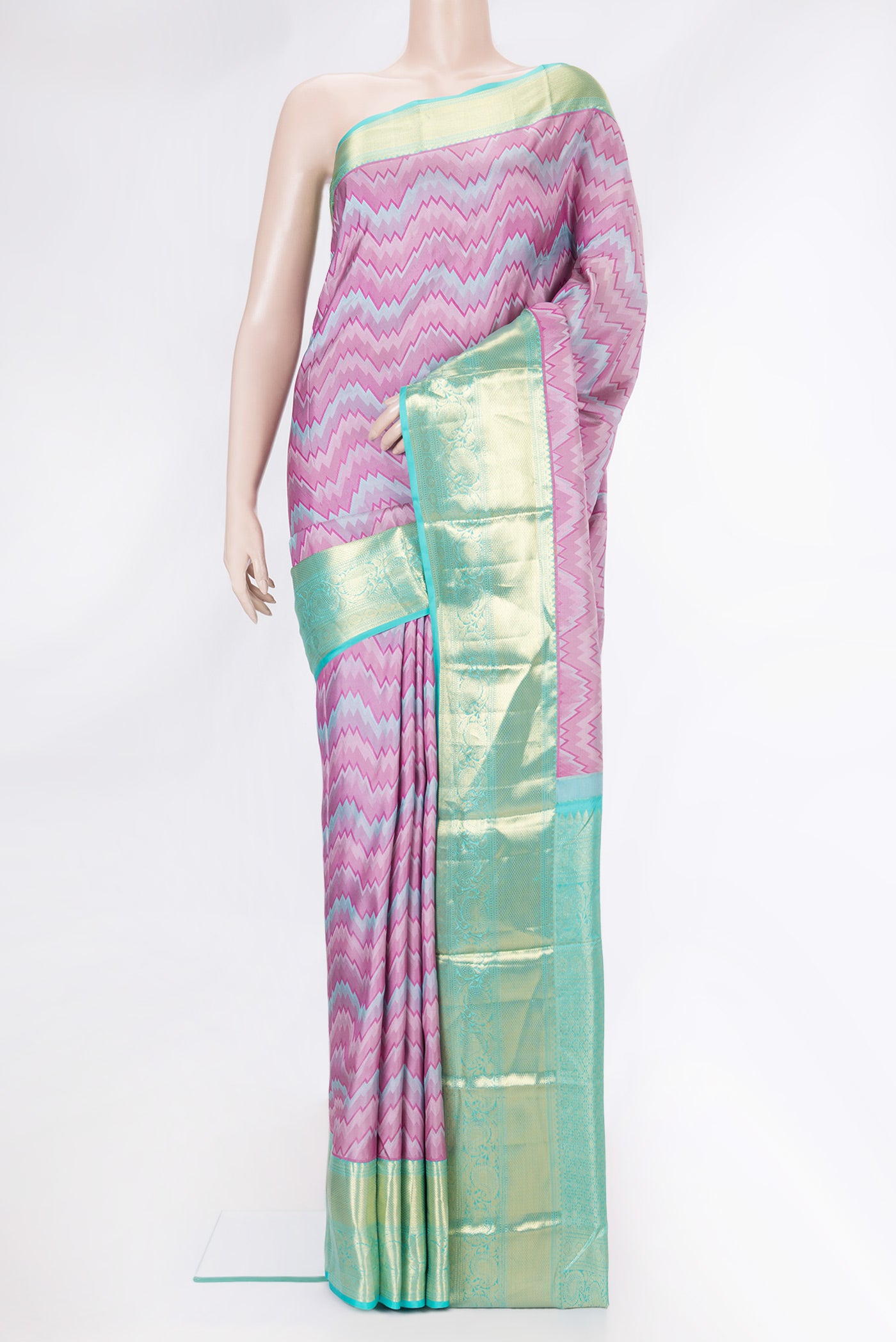 Pink Dual Tone Kanchipuram Silk Saree with Jacquard design on the body and Zari Border.  displayed on a mannequin