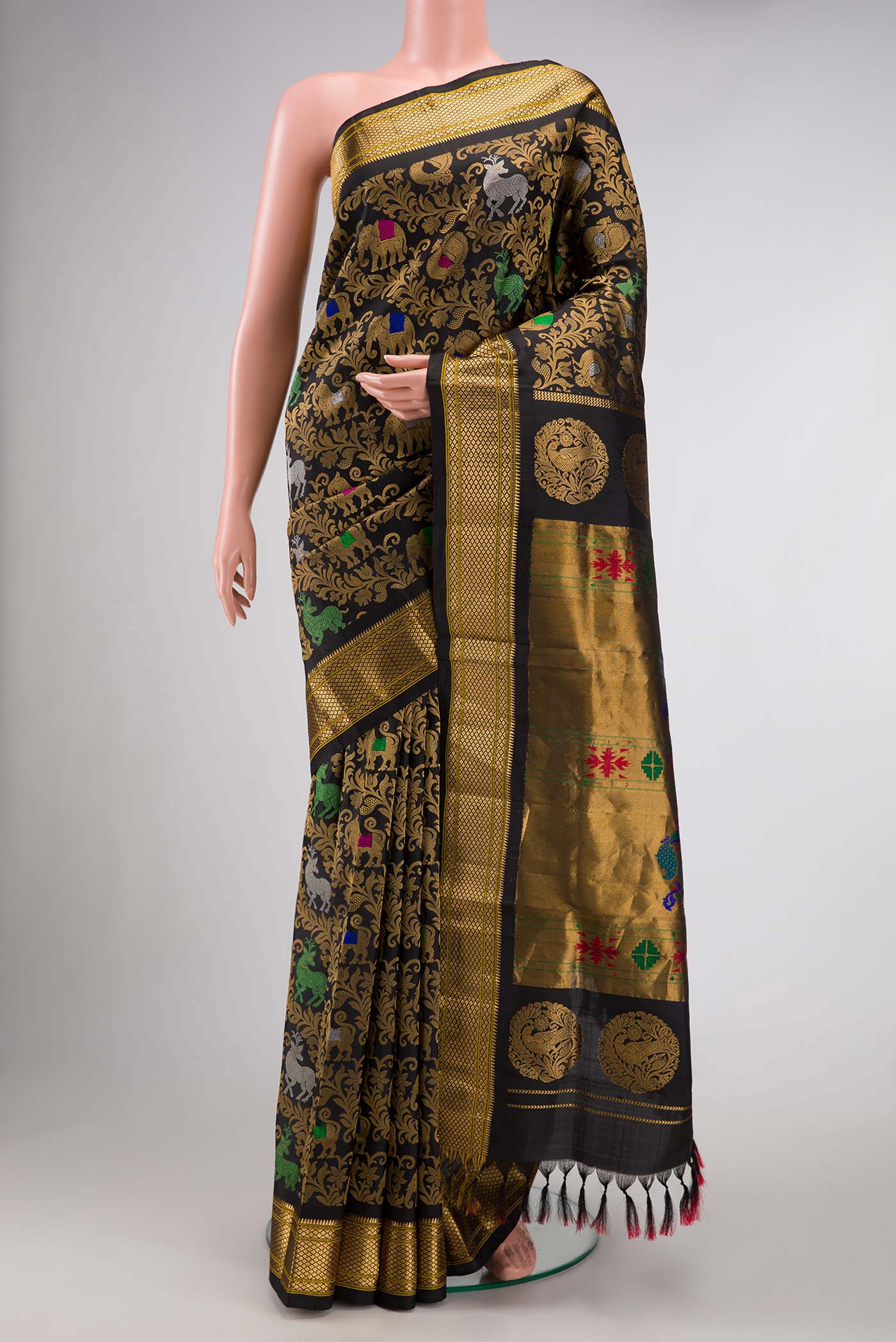 Black Dual Tone Paithani Silk Saree with Zari Brocade on the body and Zari Border.  displayed on a mannequin