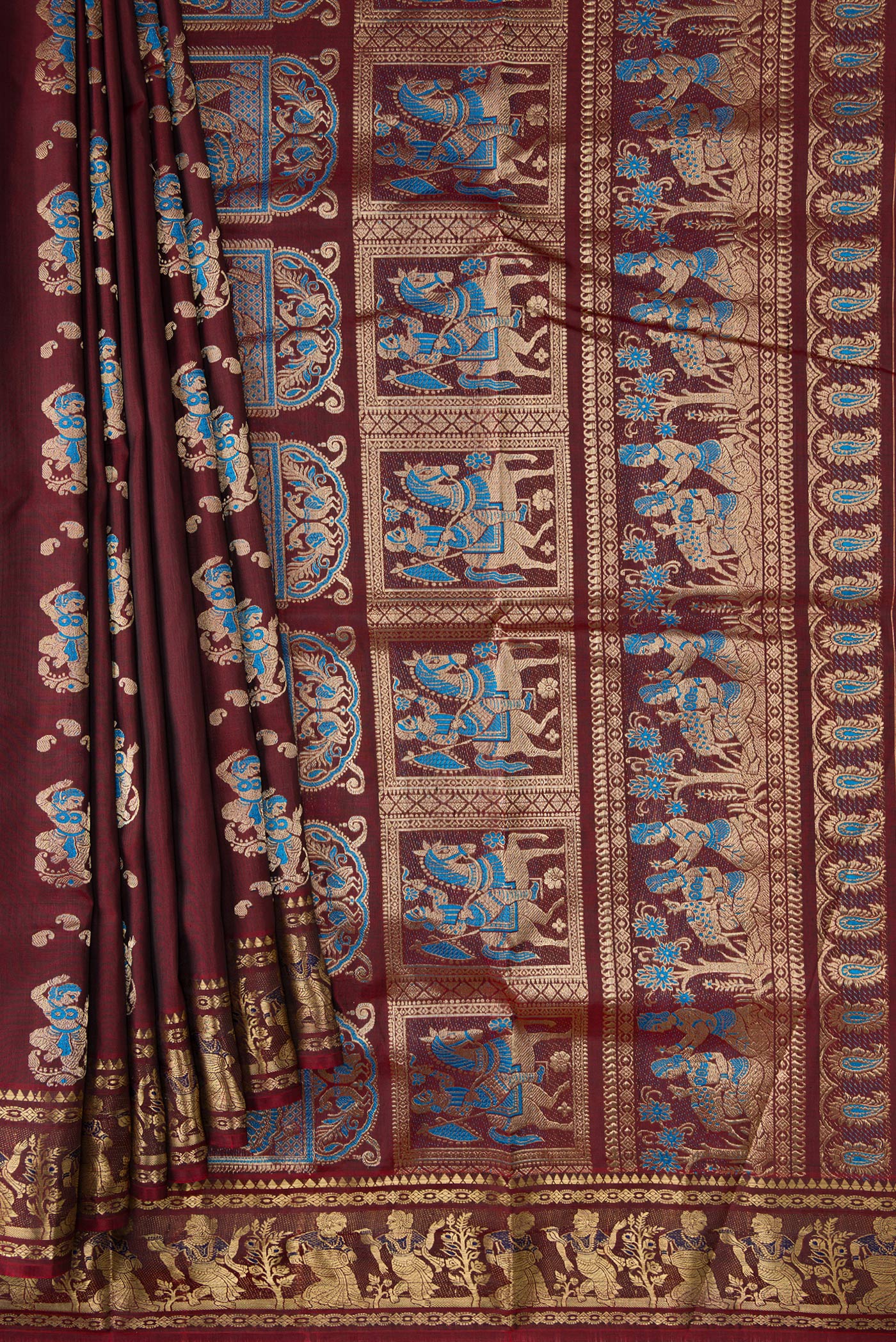 Pleats and pallu of Maroon Dual Tone Baluchari Silk Saree with Thread Butta on the body and Thread Border. 