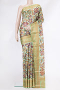 Pista Green Dual Tone Tussar Silk Saree with Printed design on the body and Thread Border.  displayed on a mannequin