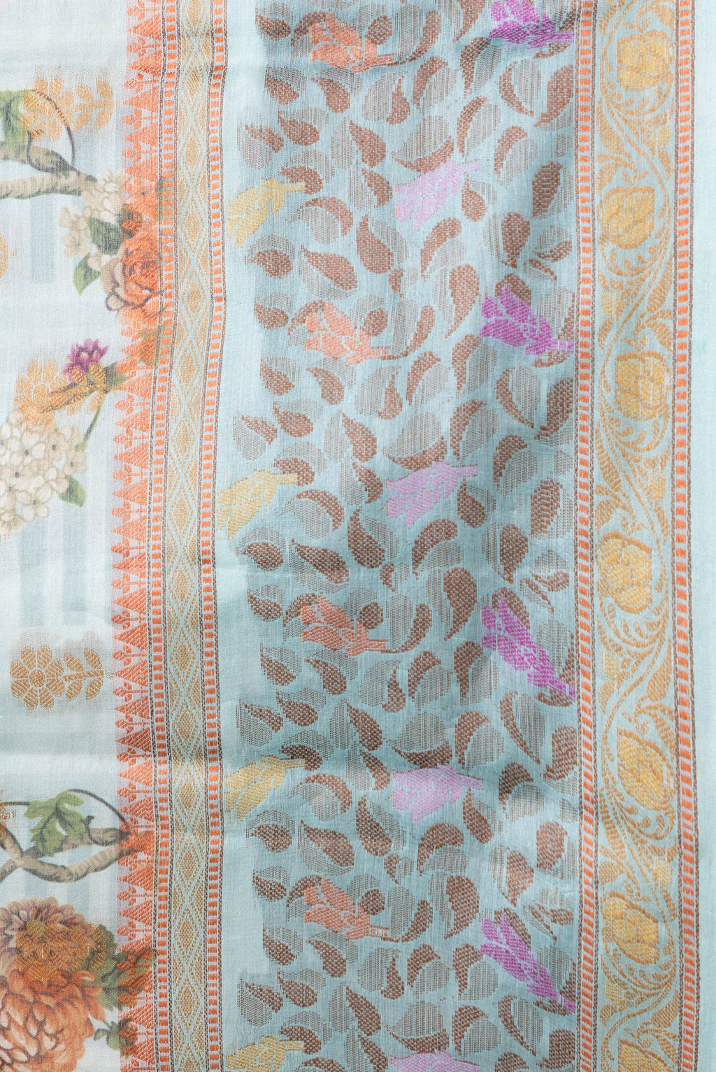Border image of Sky Blue Dual Tone Tussar Silk Saree with Printed design on the body and Thread Border. 