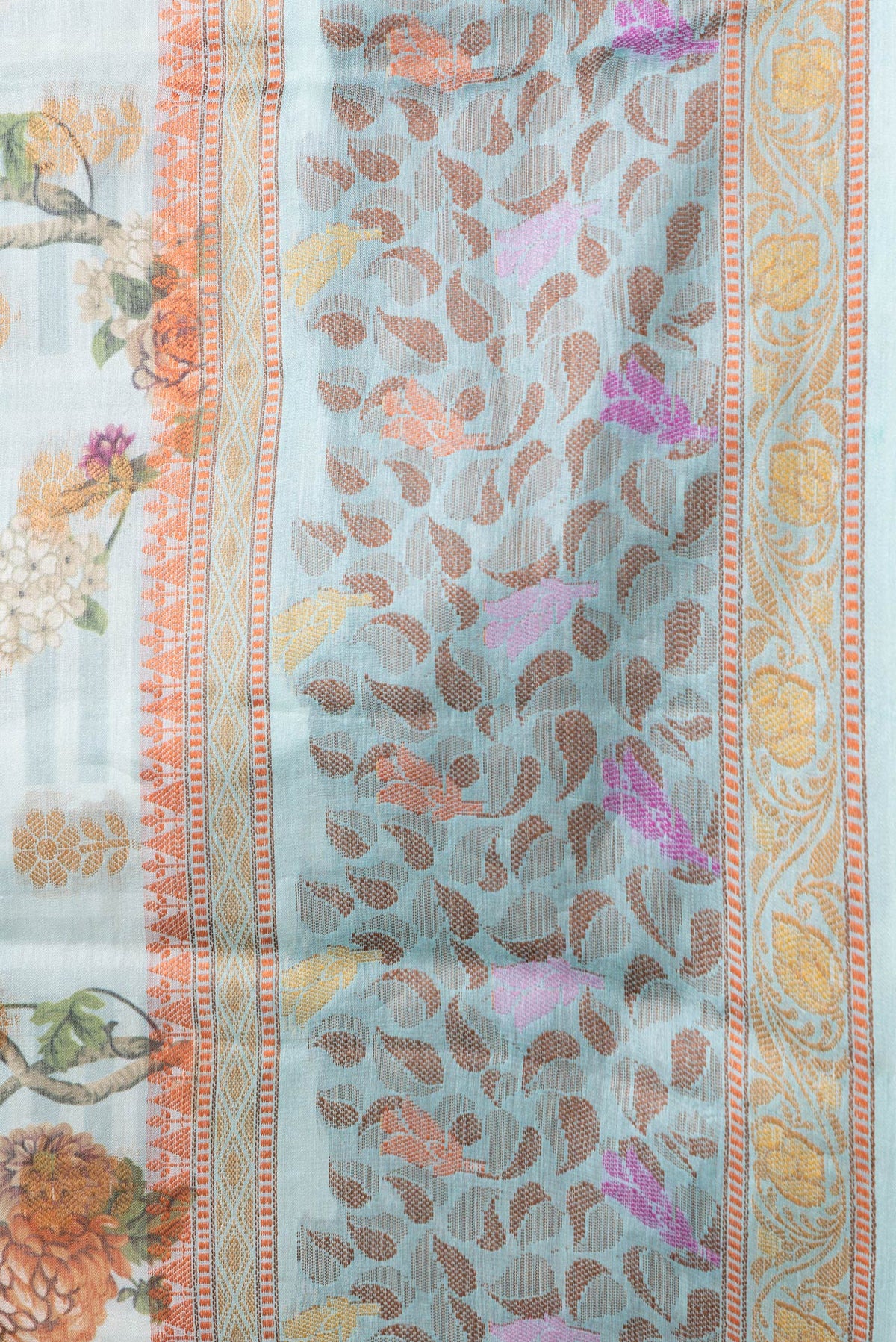 Border image of Sky Blue Dual Tone Tussar Silk Saree with Printed design on the body and Thread Border. 