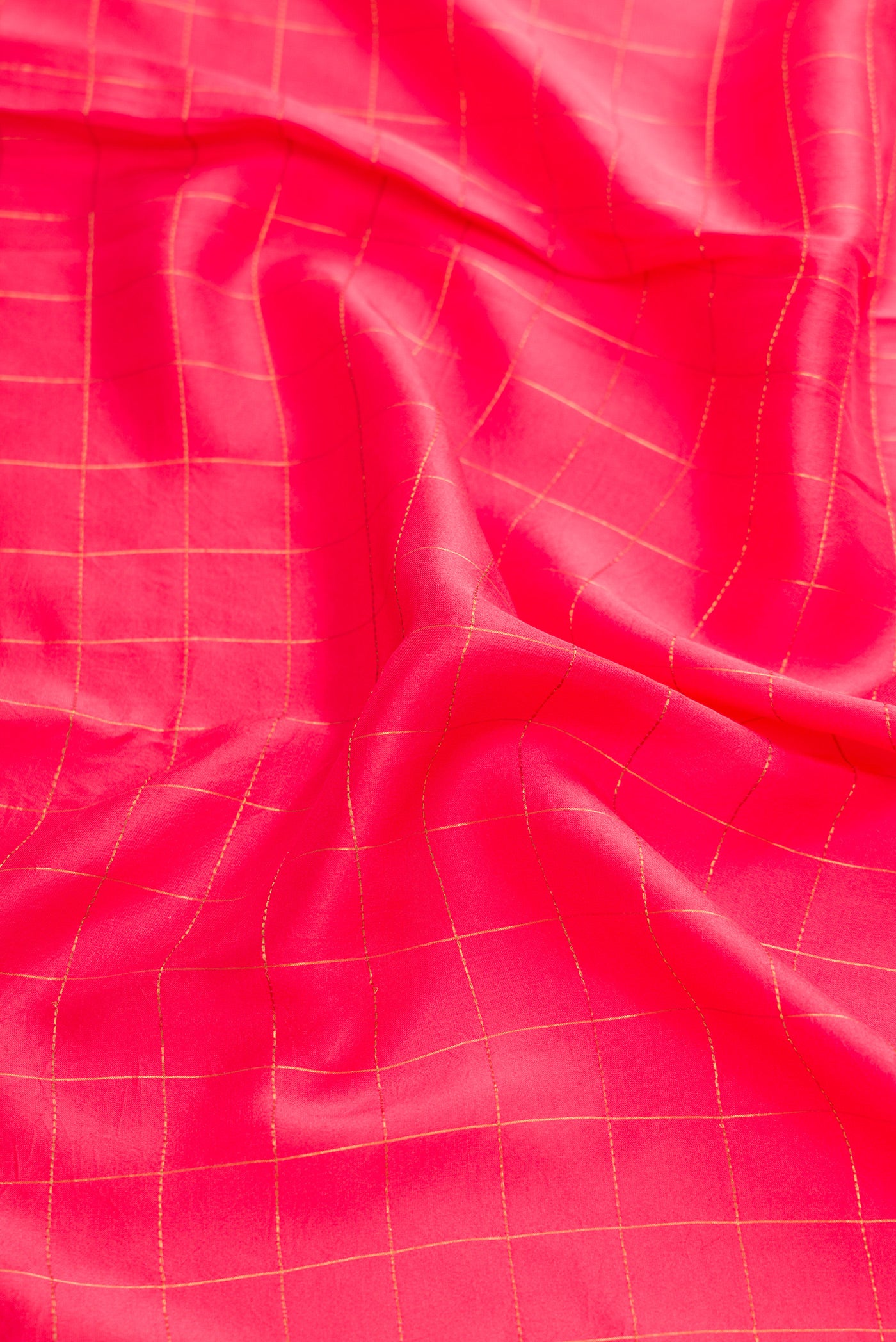 Close up of Pure Silk Pure Zari Dark Pink Dual Tone Mysore Crepe Saree with Plain Body and Zari Border.  displaying folds