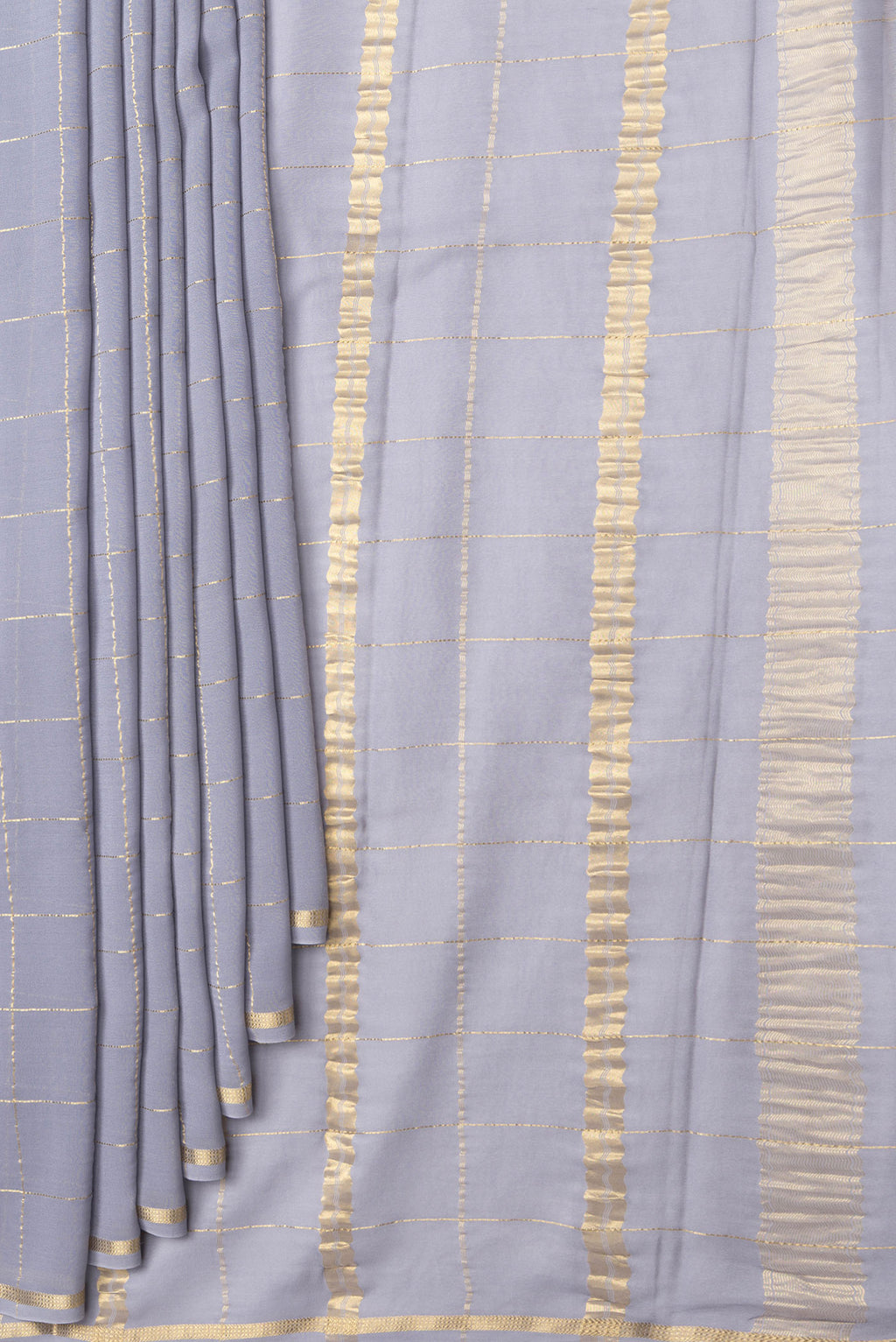 Pleats and pallu of Grey Dual Tone Georgette Saree with Checked design on the body and Zari Border. 