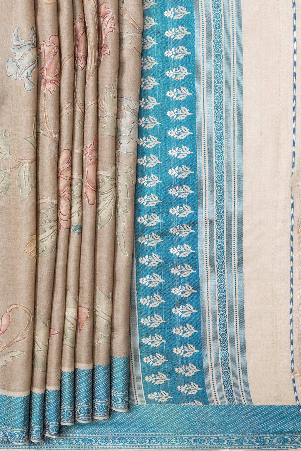 Pleats and pallu of Beige Dual Tone Tussar Silk Saree with Embroidery on the body and Thread Border. 