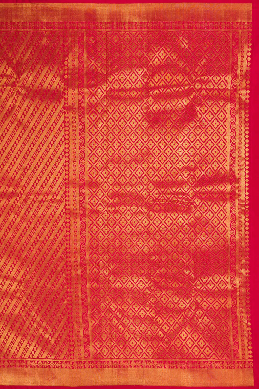 Close up image of the pallu of Maroon Dual Tone Kanchipuram Silk Saree with Zari Brocade on the body and Zari Border. 