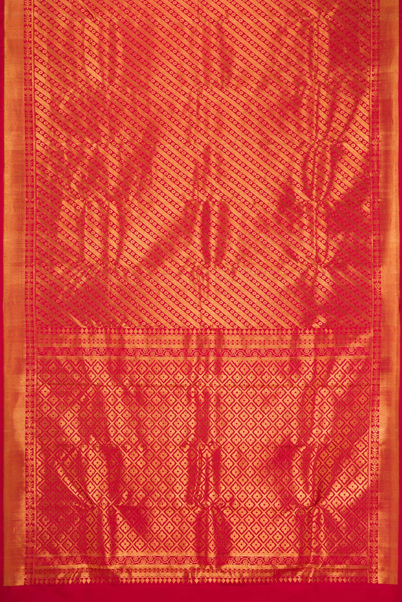 Flat view of Maroon Dual Tone Kanchipuram Silk Saree with Zari Brocade on the body and Zari Border. 