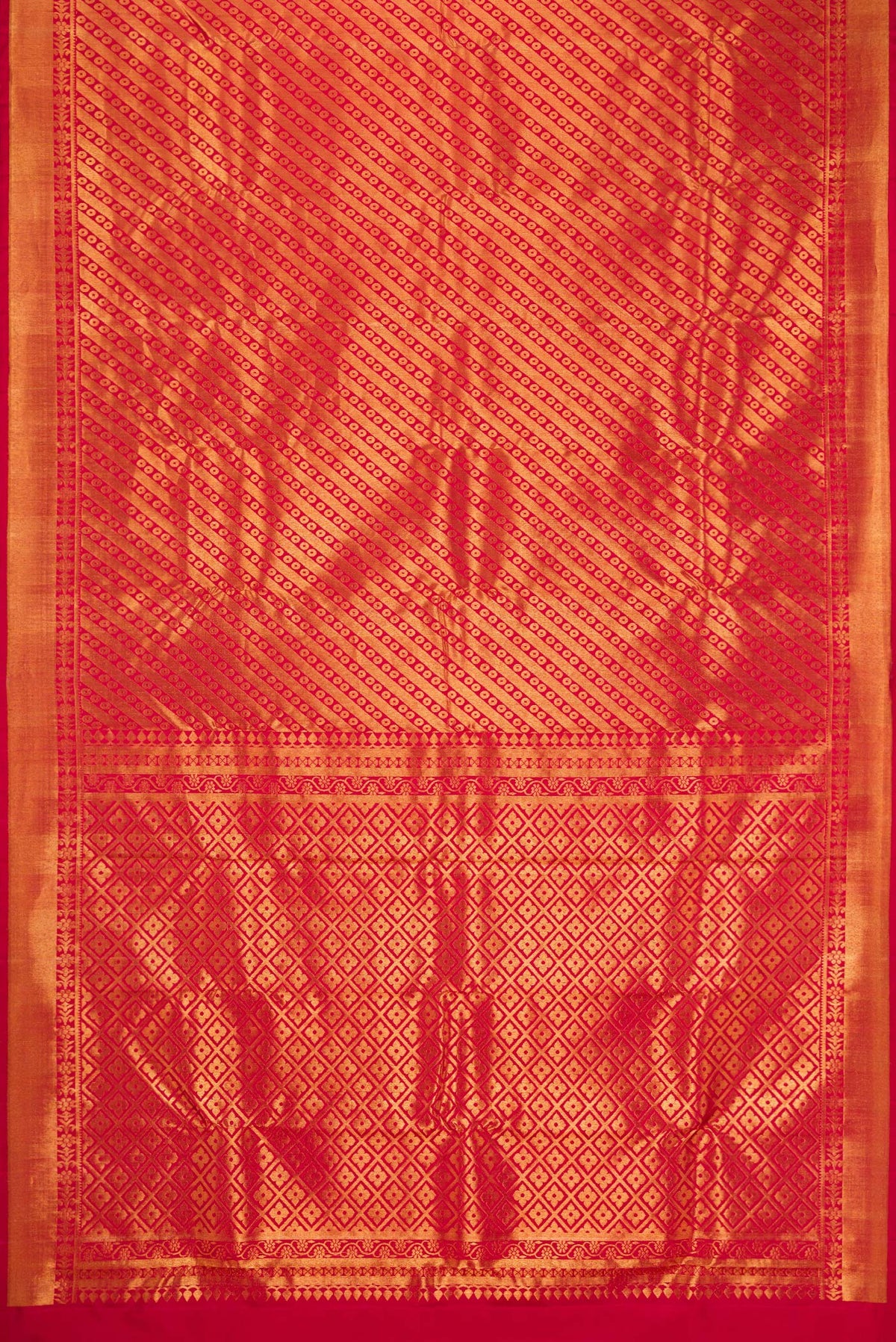 Flat view of Maroon Dual Tone Kanchipuram Silk Saree with Zari Brocade on the body and Zari Border. 