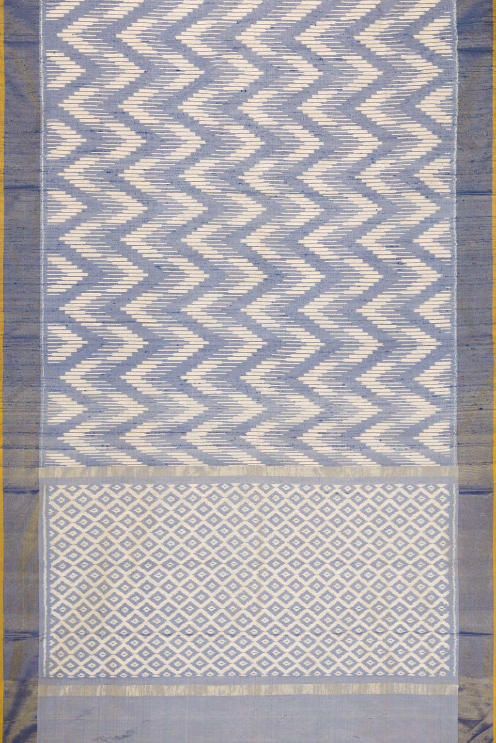 Flat view of Grey Dual Tone Double Ikat Saree with Ikat Print on the body and Zari Border. 
