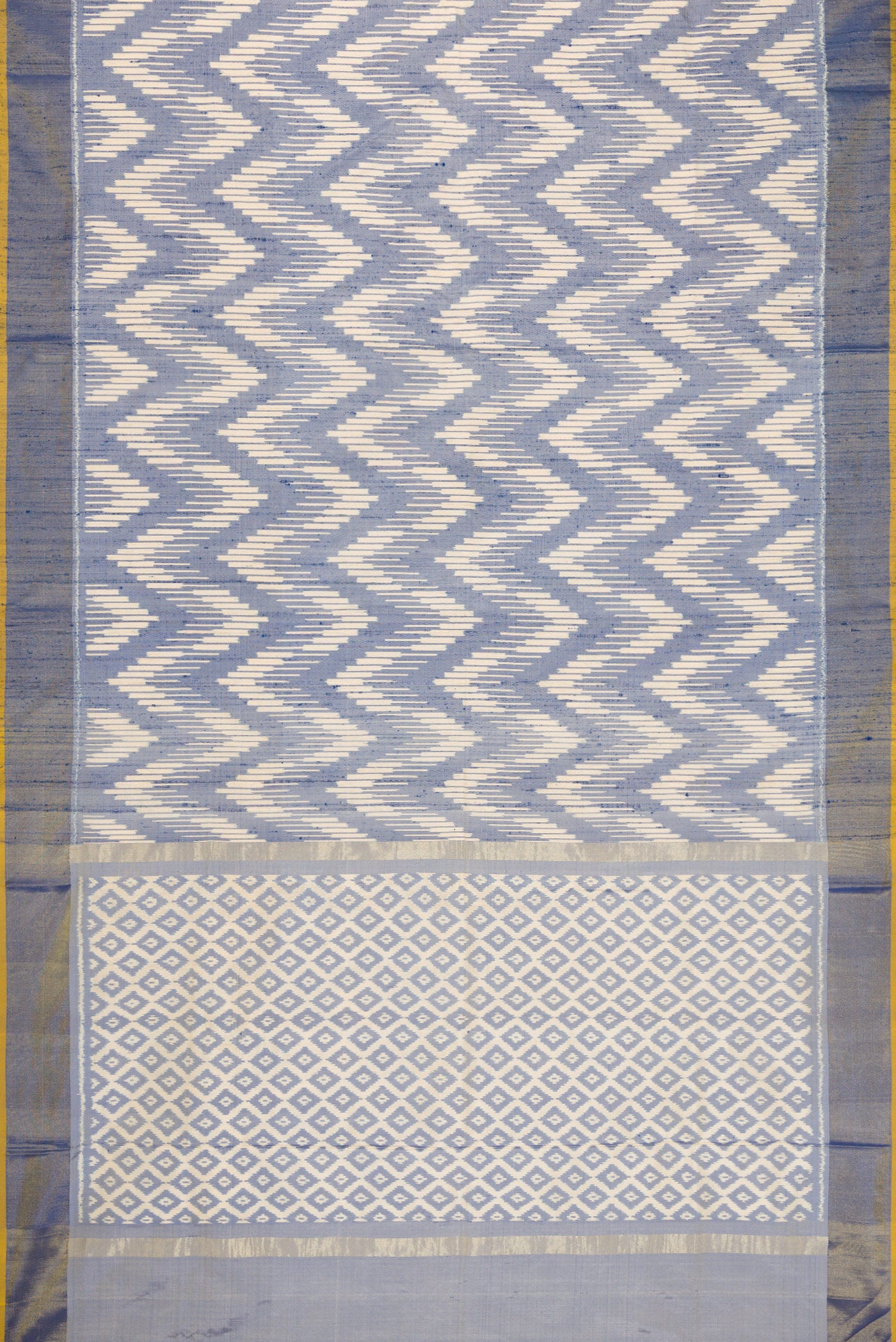 Flat view of Grey Dual Tone Double Ikat Saree with Ikat Print on the body and Zari Border. 