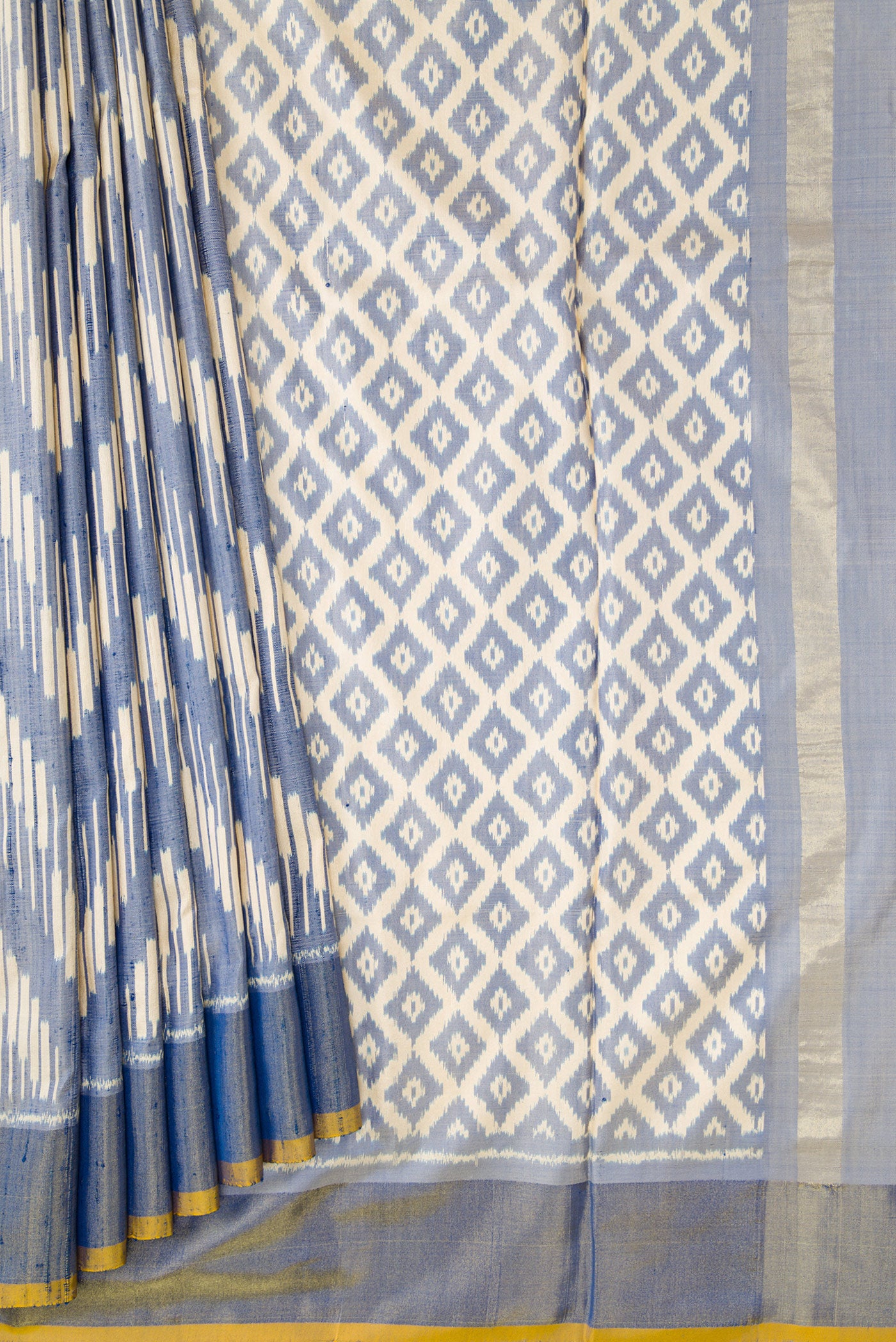 Pleats and pallu of Grey Dual Tone Double Ikat Saree with Ikat Print on the body and Zari Border. 