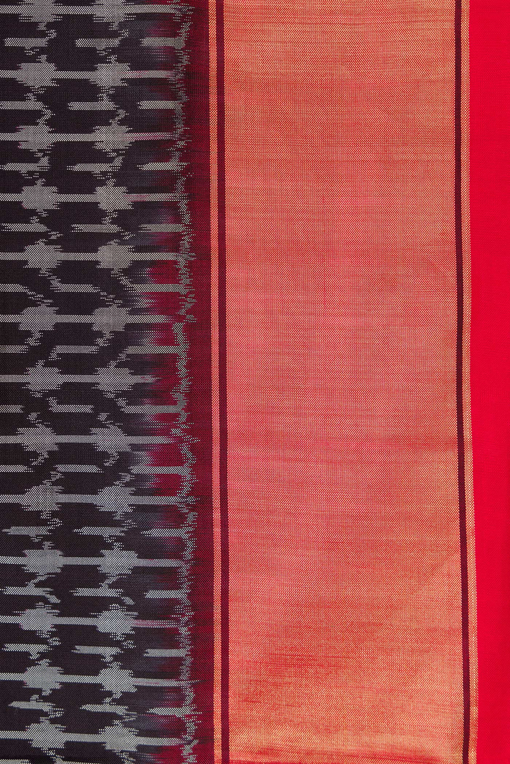 Border image of Black Dual Tone Double Ikat Saree with Ikat Print on the body and Zari Border. 