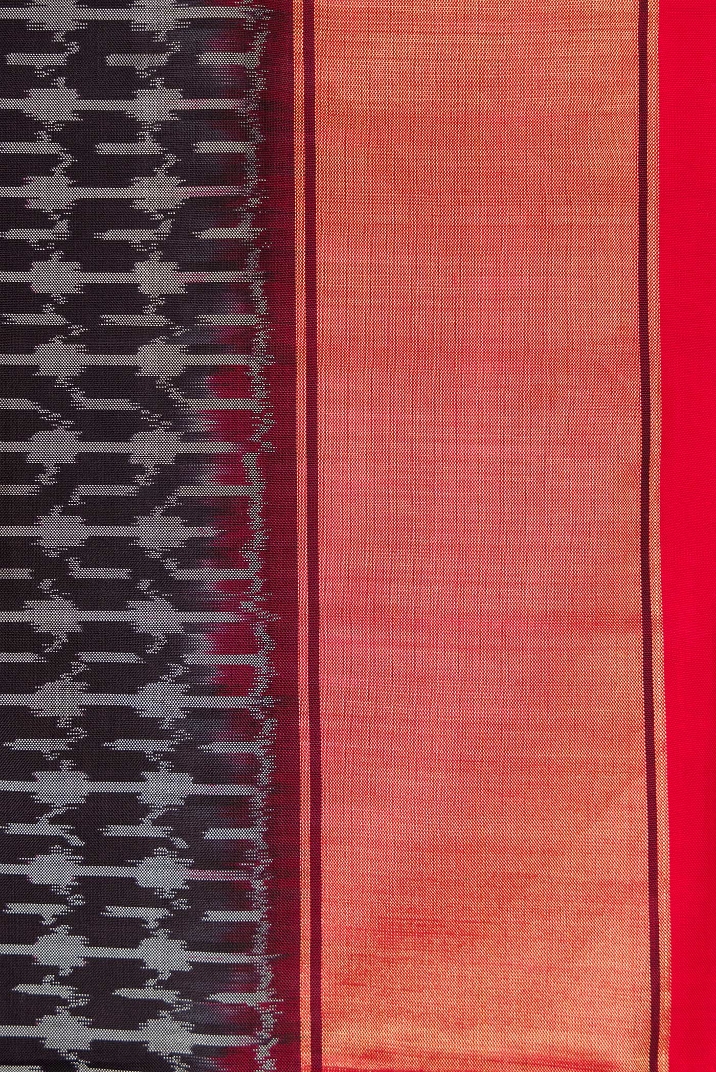 Border image of Black Dual Tone Double Ikat Saree with Ikat Print on the body and Zari Border. 