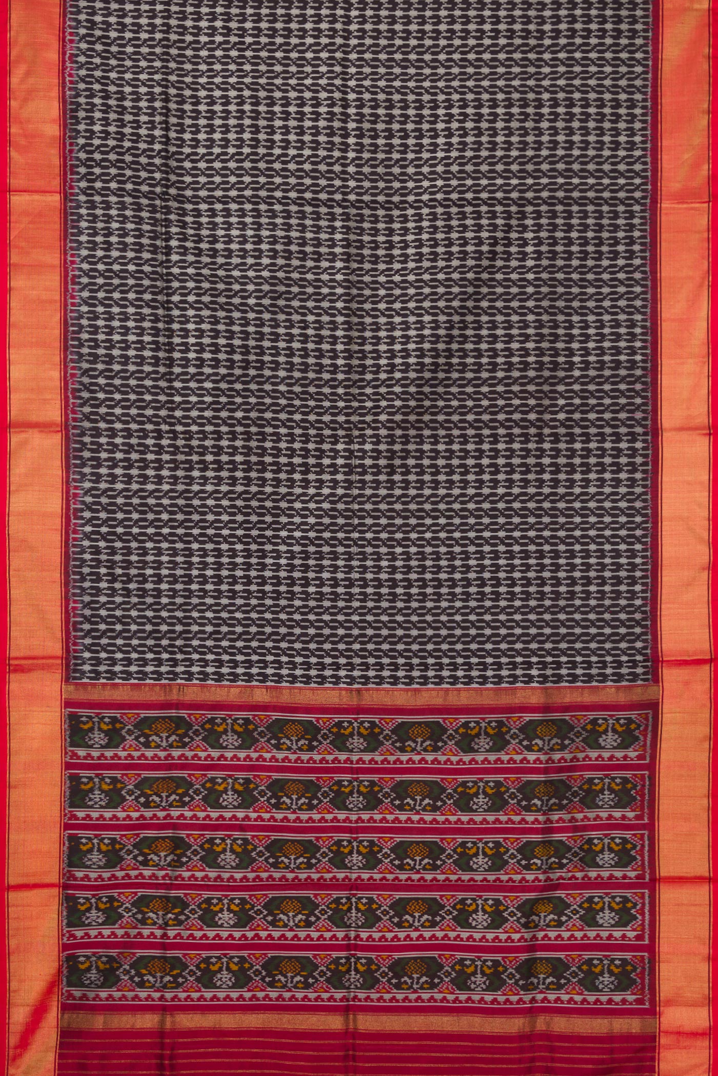 Flat view of Black Dual Tone Double Ikat Saree with Ikat Print on the body and Zari Border. 