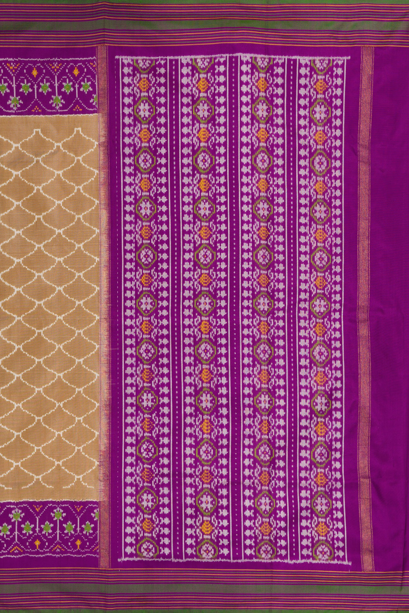 Close up image of the pallu of Dark Beige Dual Tone Double Ikat Saree with Ikat Print on the body and Ikat Border. 