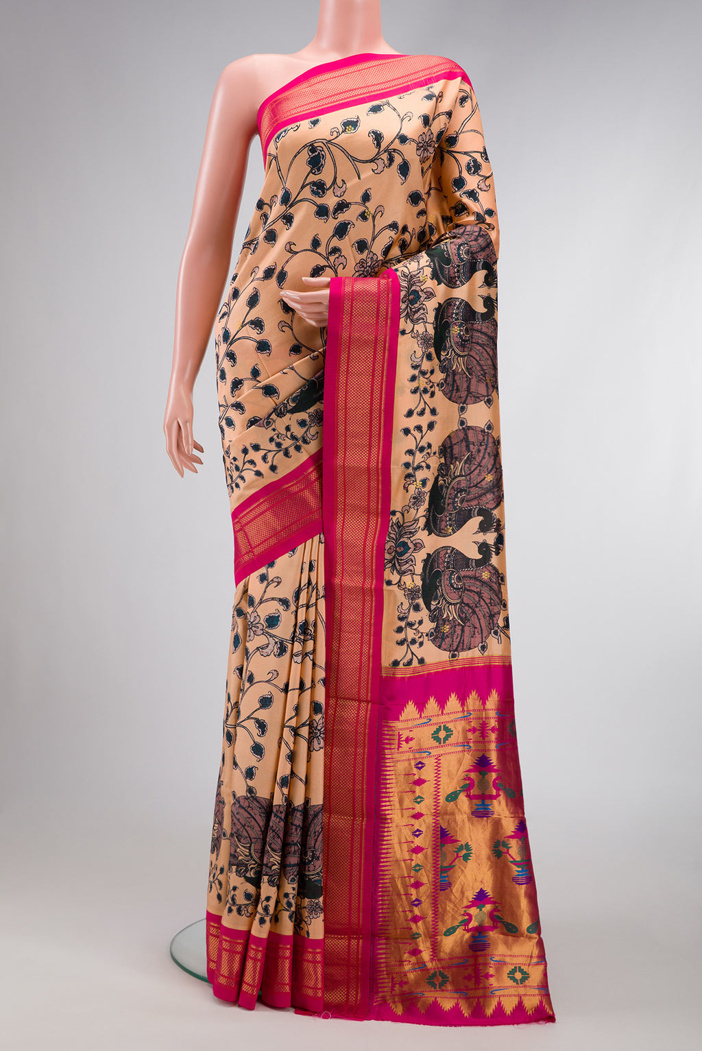Peach Dual Tone Paithani Silk Saree with Printed design on the body and Zari Border.  displayed on a mannequin