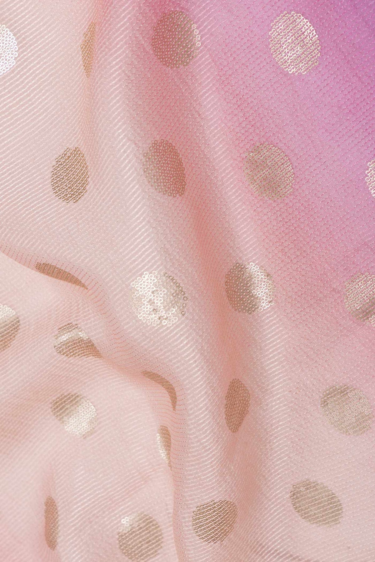 Close up of Pink Dual Tone Organza Silk Saree with Embroidery on the body and Embroidery Border displaying folds