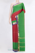 Maroon Mysore Silk Saree with Stripes on the body and Zari Border.  displayed on a mannequin