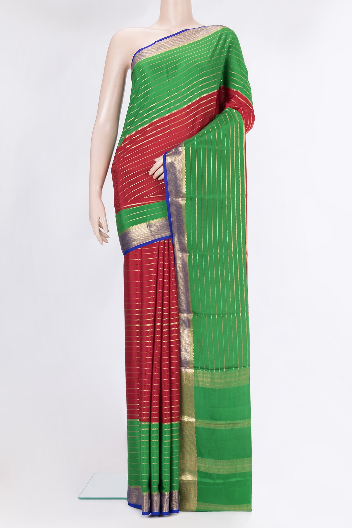 Maroon Mysore Silk Saree with Stripes on the body and Zari Border.  displayed on a mannequin