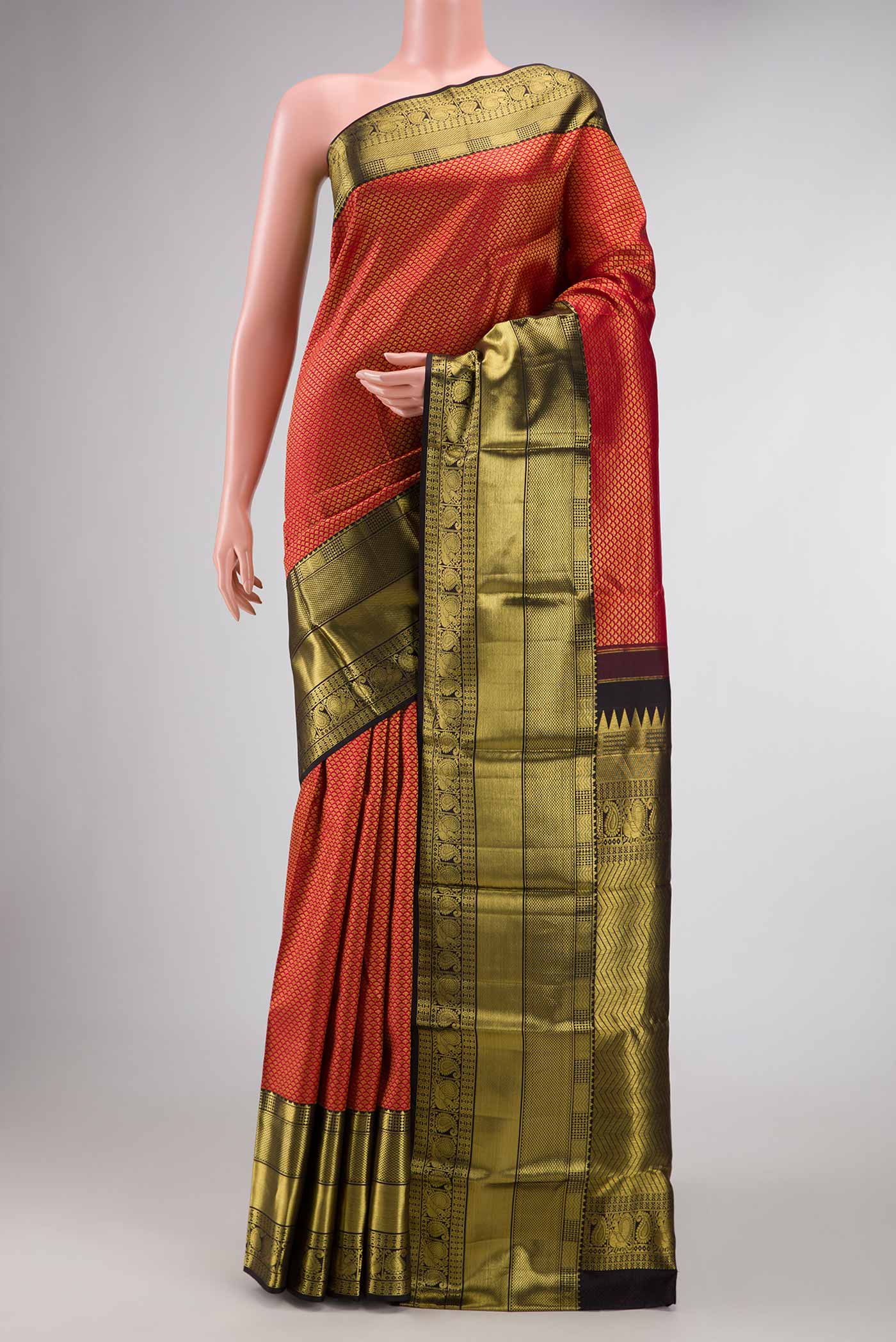 Maroon Dual Tone Kanchipuram Saree with Zari Brocade on the body and Zari Border displayed on a mannequin