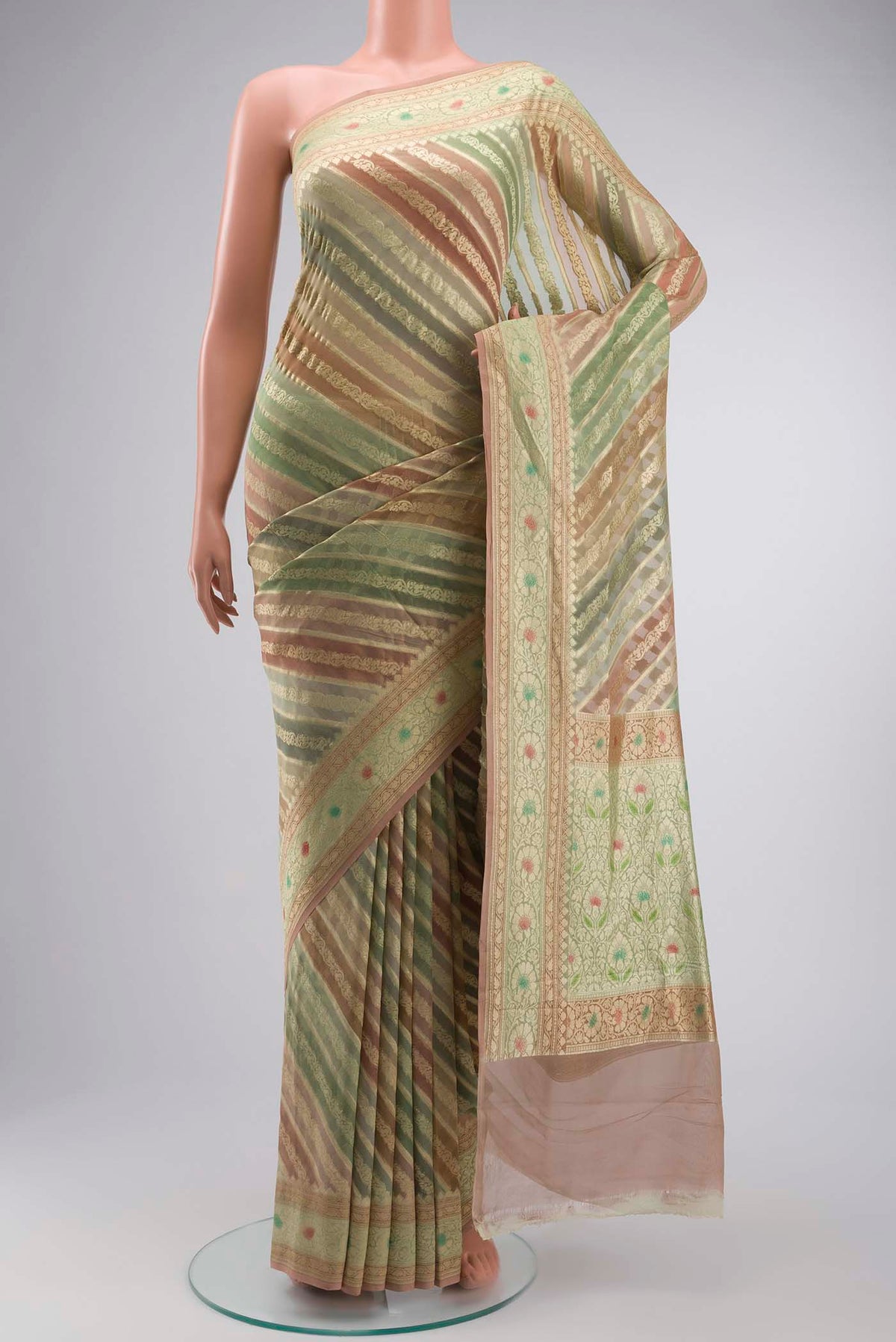 Green Banarasi Georgette Saree with Stripes on the body and Zari Border displayed on a mannequin