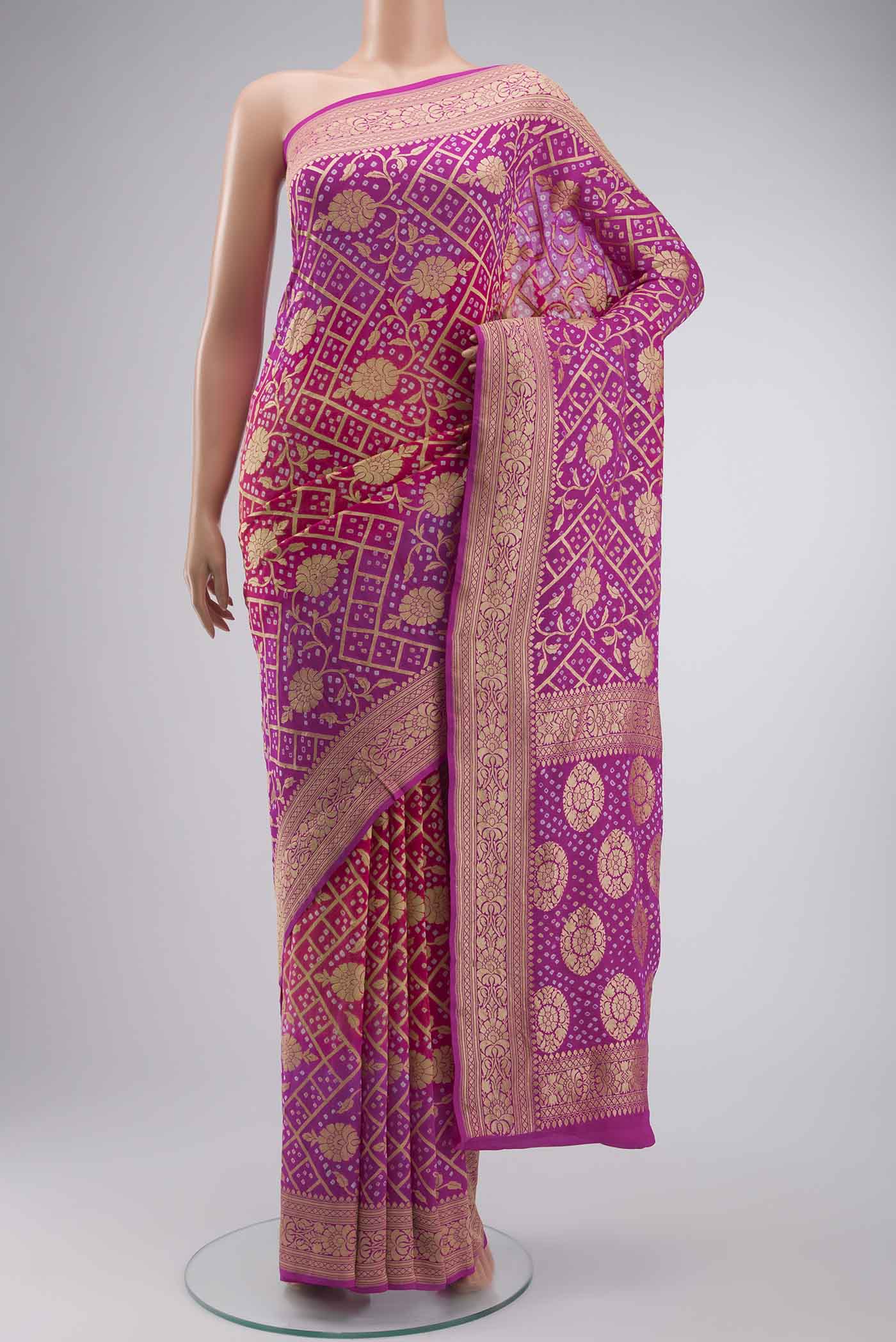 Rani Pink Banarasi Georgette Saree with Zari Butta on the body and Zari Border displayed on a mannequin