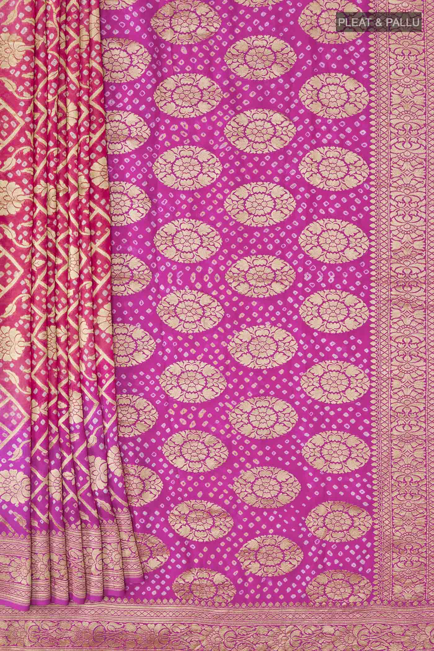 Pleats and pallu of Rani Pink Banarasi Georgette Saree with Zari Butta on the body and Zari Border