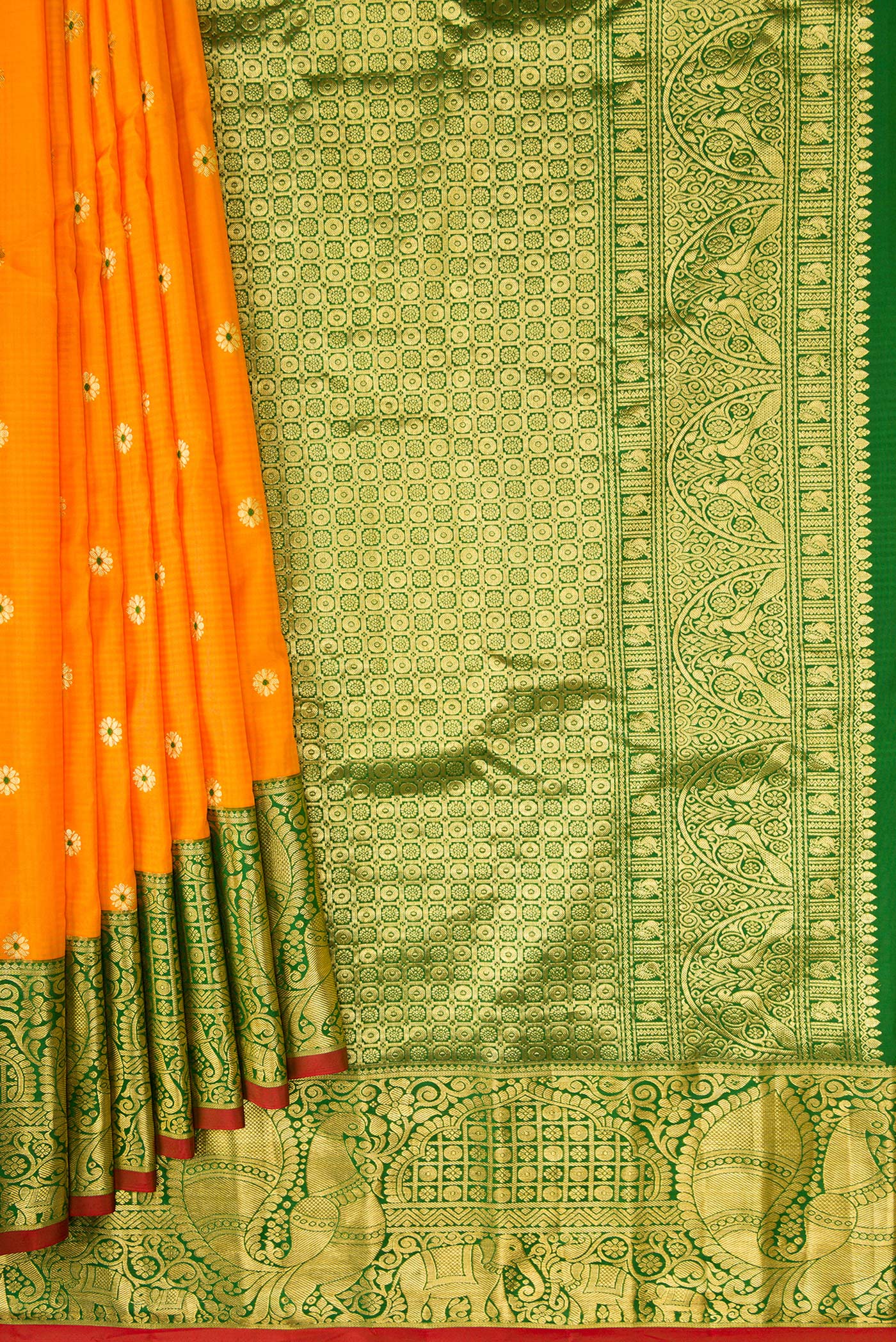 Pleats and pallu of Mustard Dual Tone Gadwal Silk Saree with Zari And Thread Butta on the body and Zari Border. 