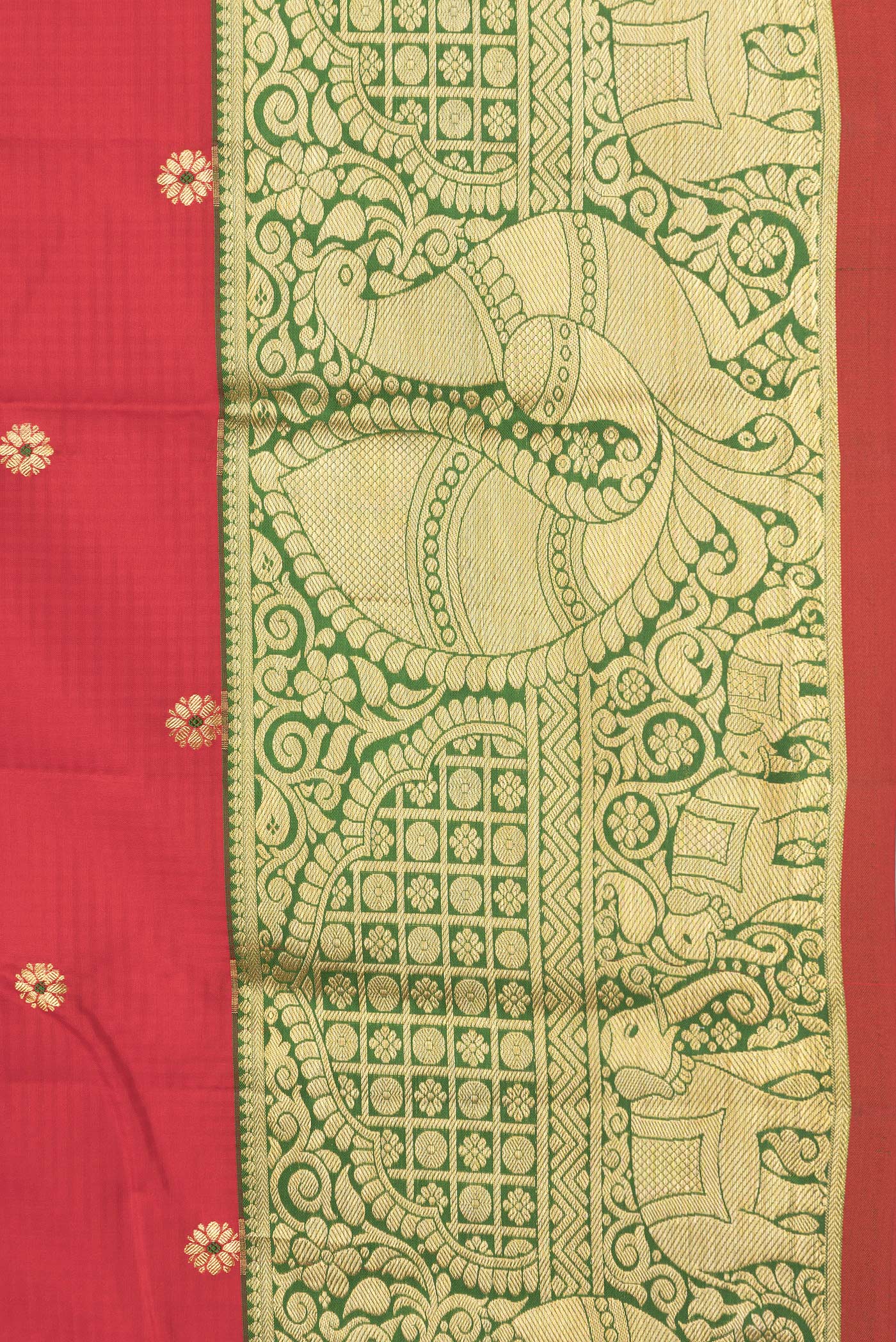 Border image of Red Dual Tone Kanchipuram Silk Saree with Zari And Thread Butta on the body and Zari Border. 