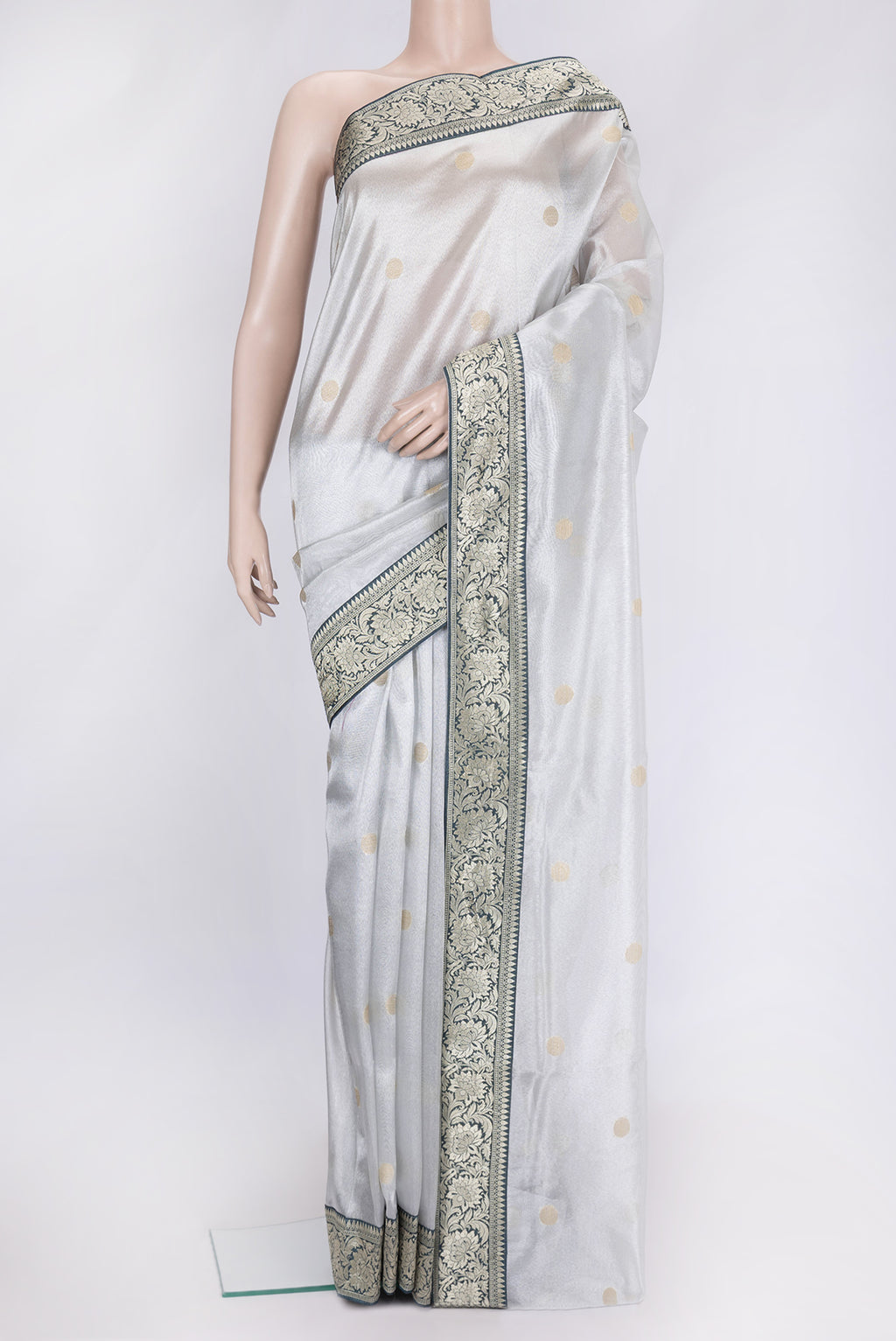 Grey Dual Tone Organza Silk Saree with Zari Brocade on the body and Zari Border.  displayed on a mannequin