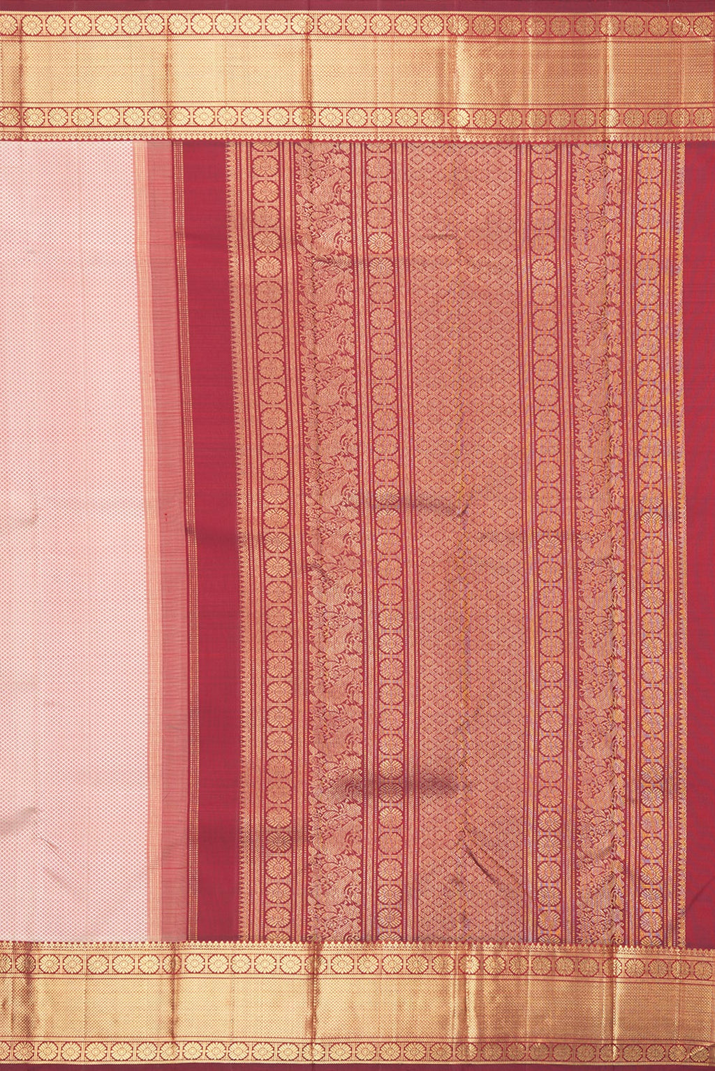 Close up image of the pallu of Pure Silk Pure Zari Peach Dual Tone Kanjivaram Saree with Jacquard design on the body and Zari Border. 