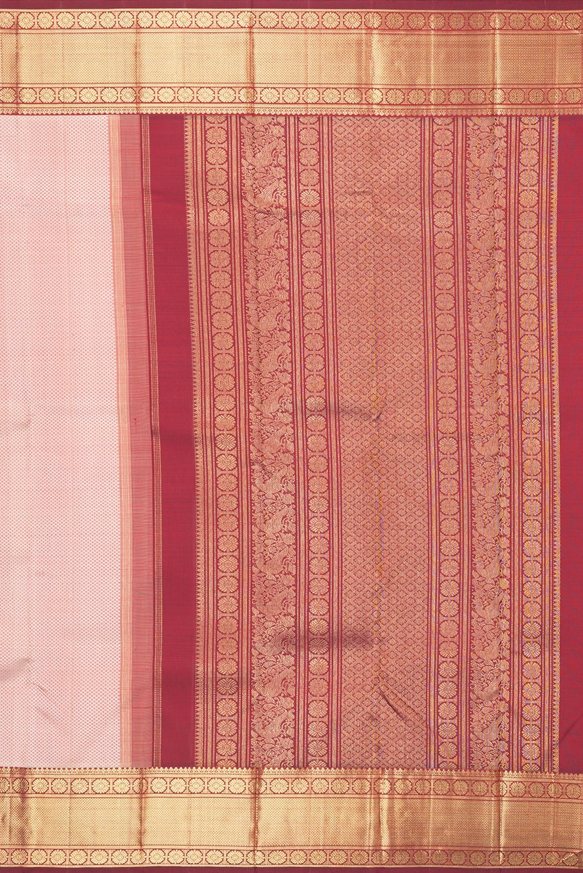 Close up image of the pallu of Pure Silk Pure Zari Peach Dual Tone Kanjivaram Saree with Jacquard design on the body and Zari Border. 