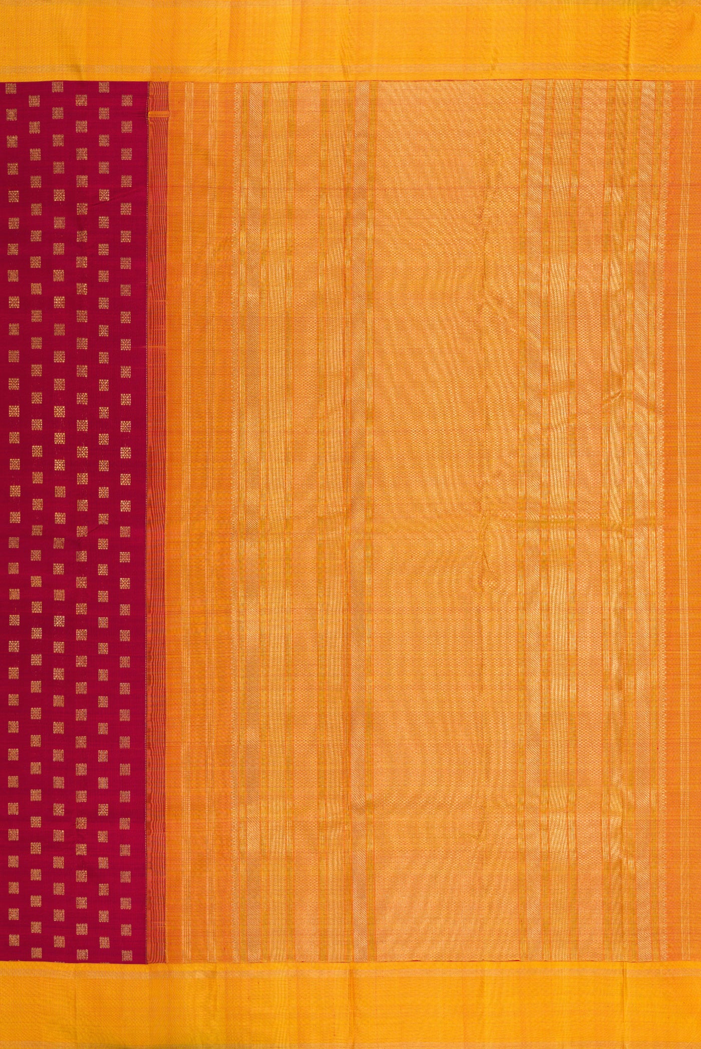 Close up image of the pallu of Pure Silk Pure Zari Maroon Kanchipuram Saree with Zari Butta on the body and Plain Border. 