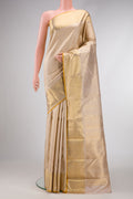 Pure Silk Pure Zari Dark Beige Dual Tone Kanjivaram Saree with Zari Brocade on the body and Zari Border.  displayed on a mannequin