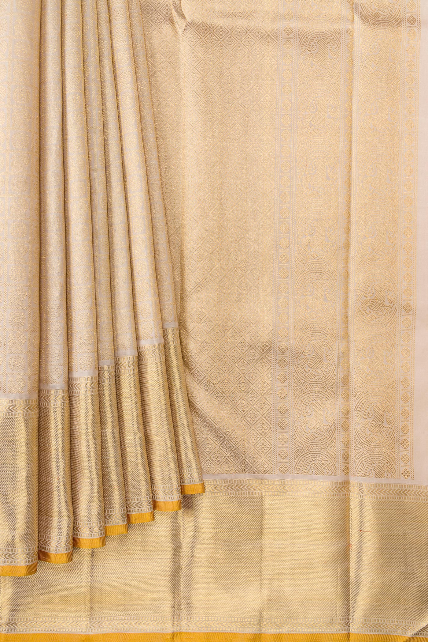 Pleats and pallu of Pure Silk Pure Zari Dark Beige Dual Tone Kanjivaram Saree with Zari Brocade on the body and Zari Border. 