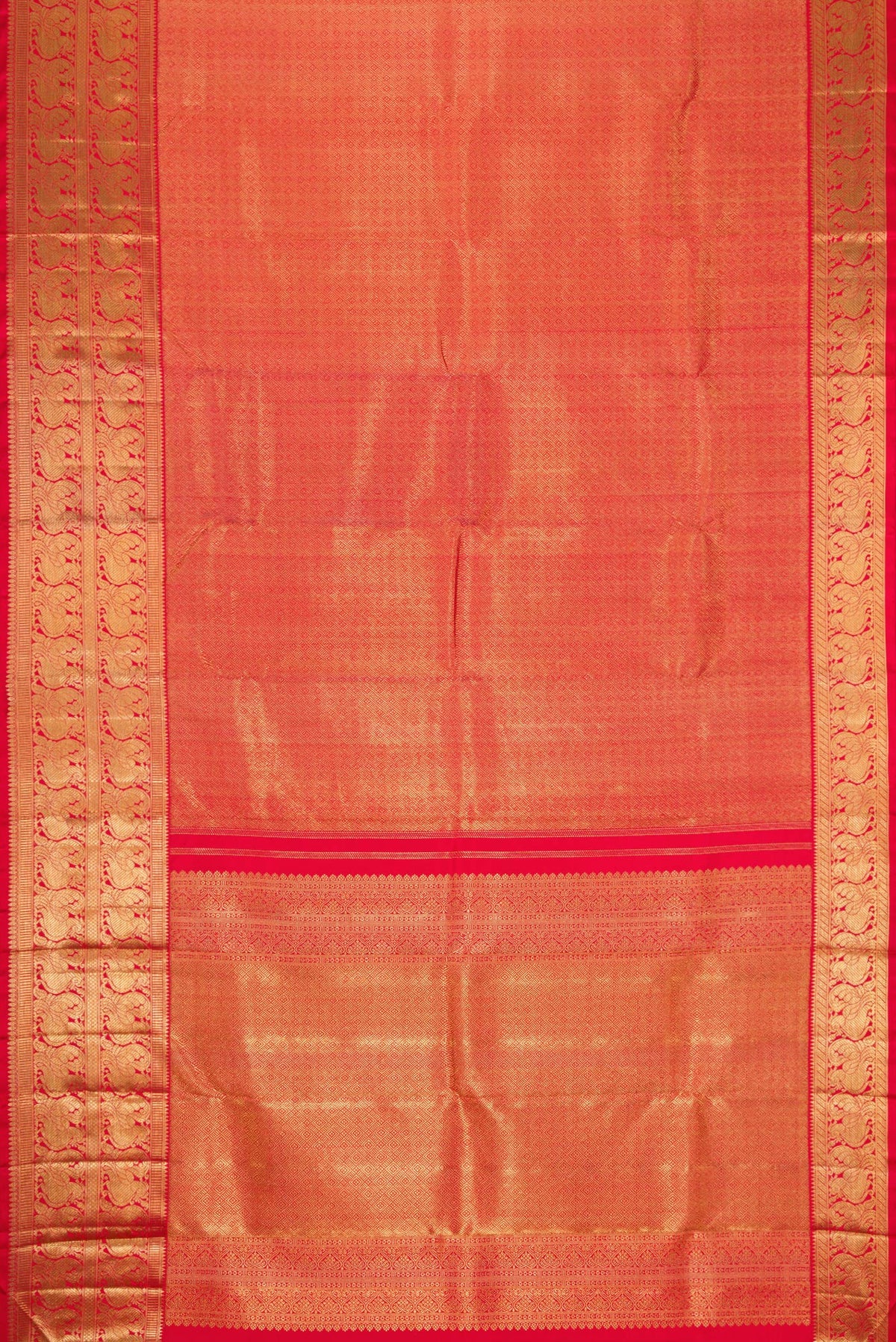 Flat view of Pure Silk Pure Zari Red Dual Tone Kanjivaram Saree with Zari Brocade on the body and Zari Border. 