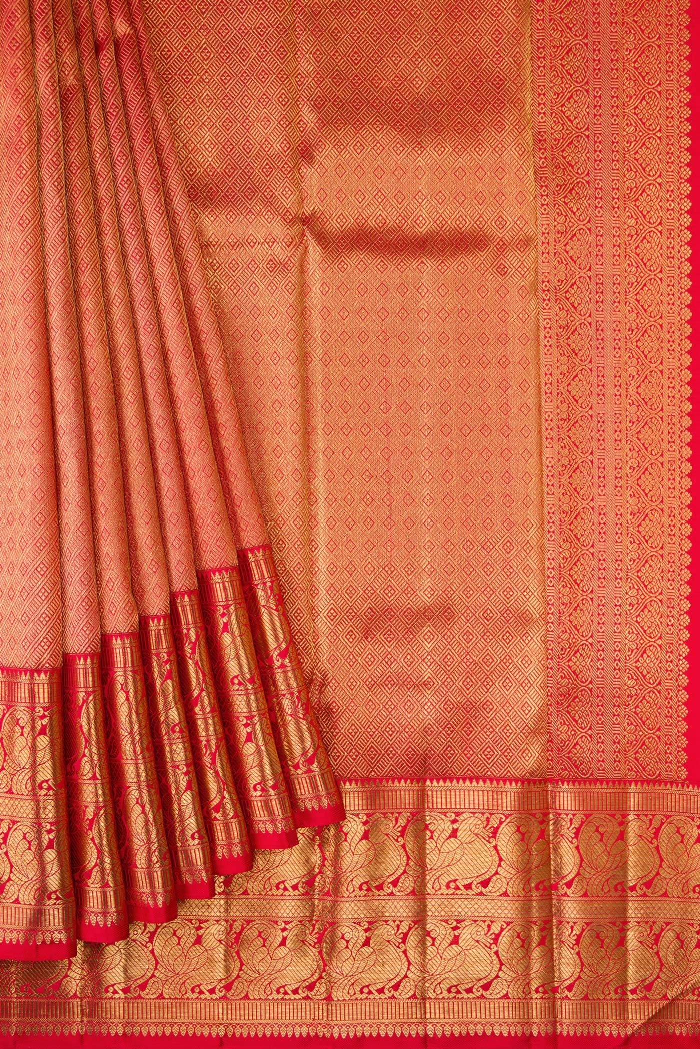 Pleats and pallu of Pure Silk Pure Zari Red Dual Tone Kanjivaram Saree with Zari Brocade on the body and Zari Border. 