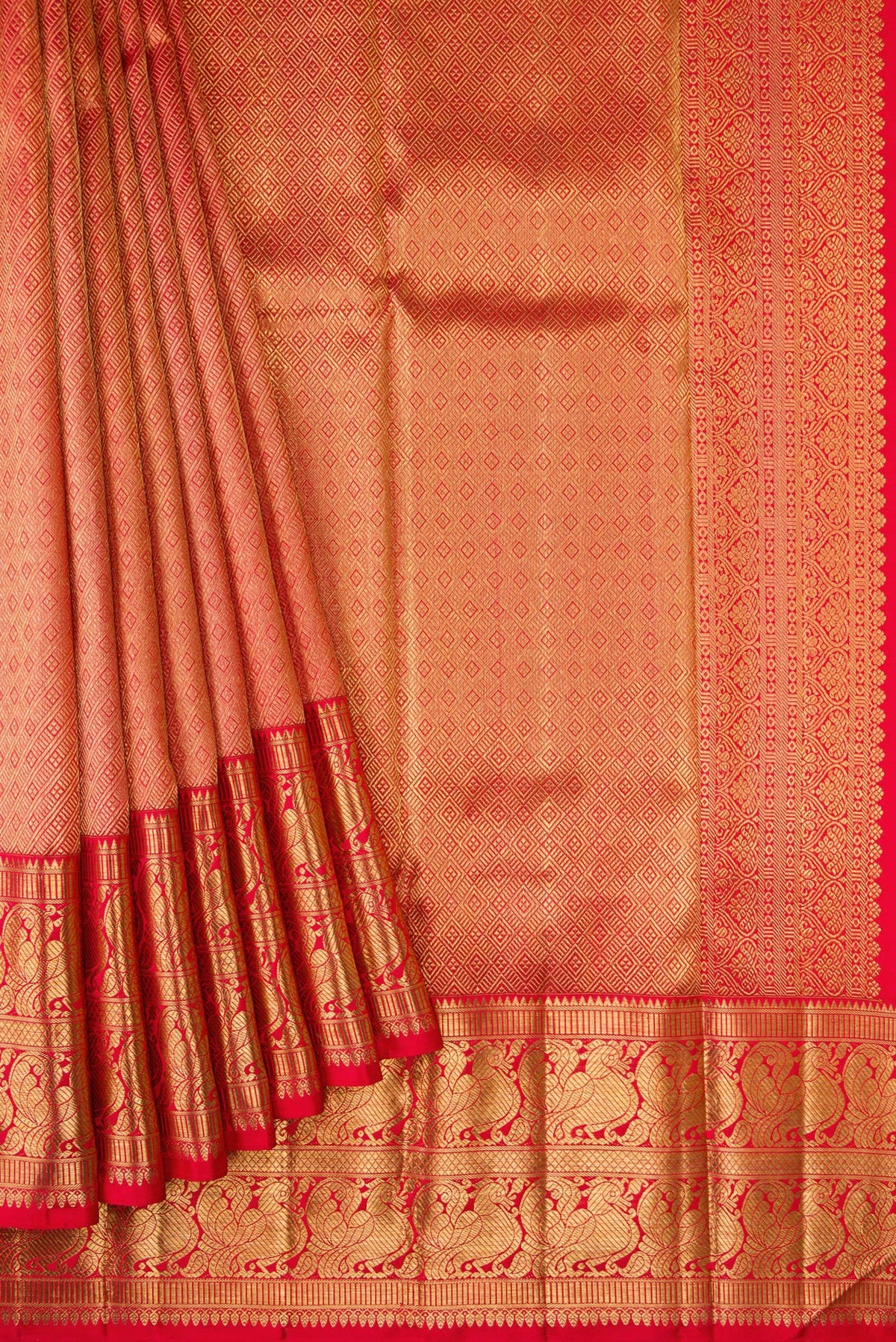 Pleats and pallu of Pure Silk Pure Zari Red Dual Tone Kanjivaram Saree with Zari Brocade on the body and Zari Border. 
