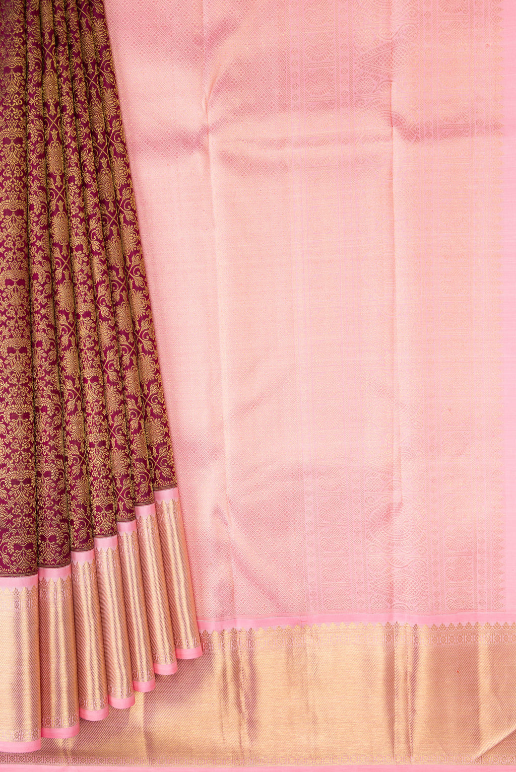 Pleats and pallu of Pure Silk Pure Zari Maroon Dual Tone Kanjivaram Saree with Zari Brocade on the body and Zari Border. 