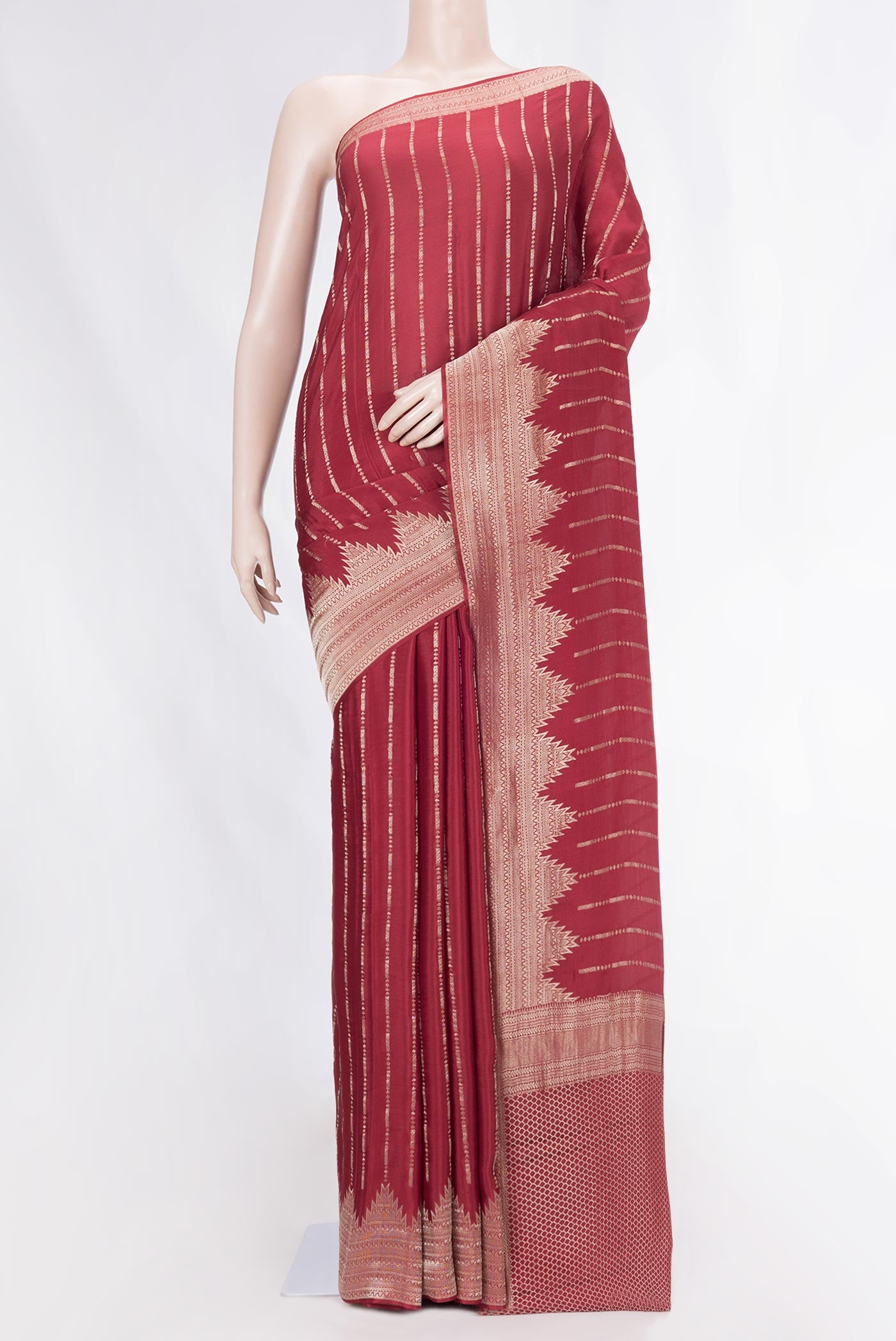 Maroon Mysore Crepe Saree with Stripes on the body and Fancy Border displayed on a mannequin