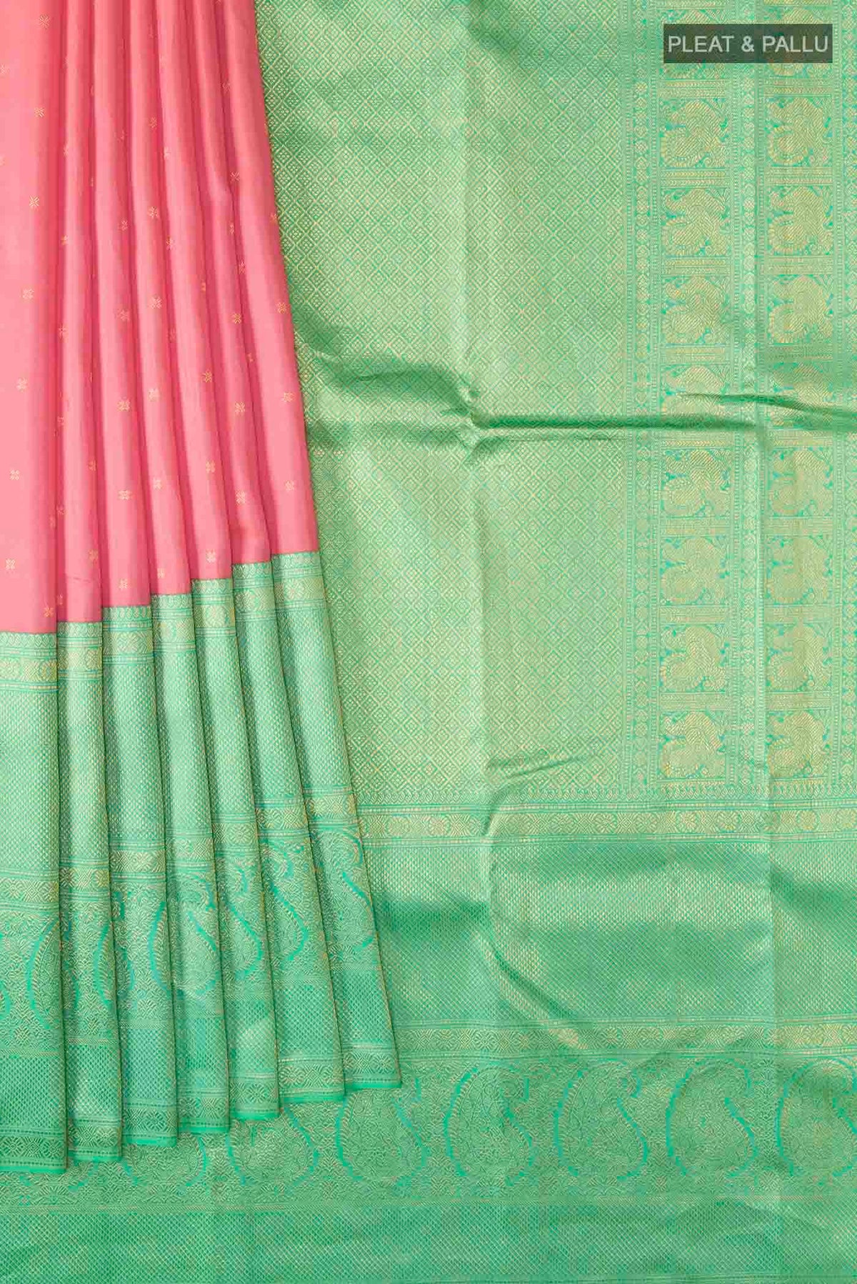 Pleats and pallu of Pink Kanchipuram Silk Saree with Zari Butta on the body and Zari Border