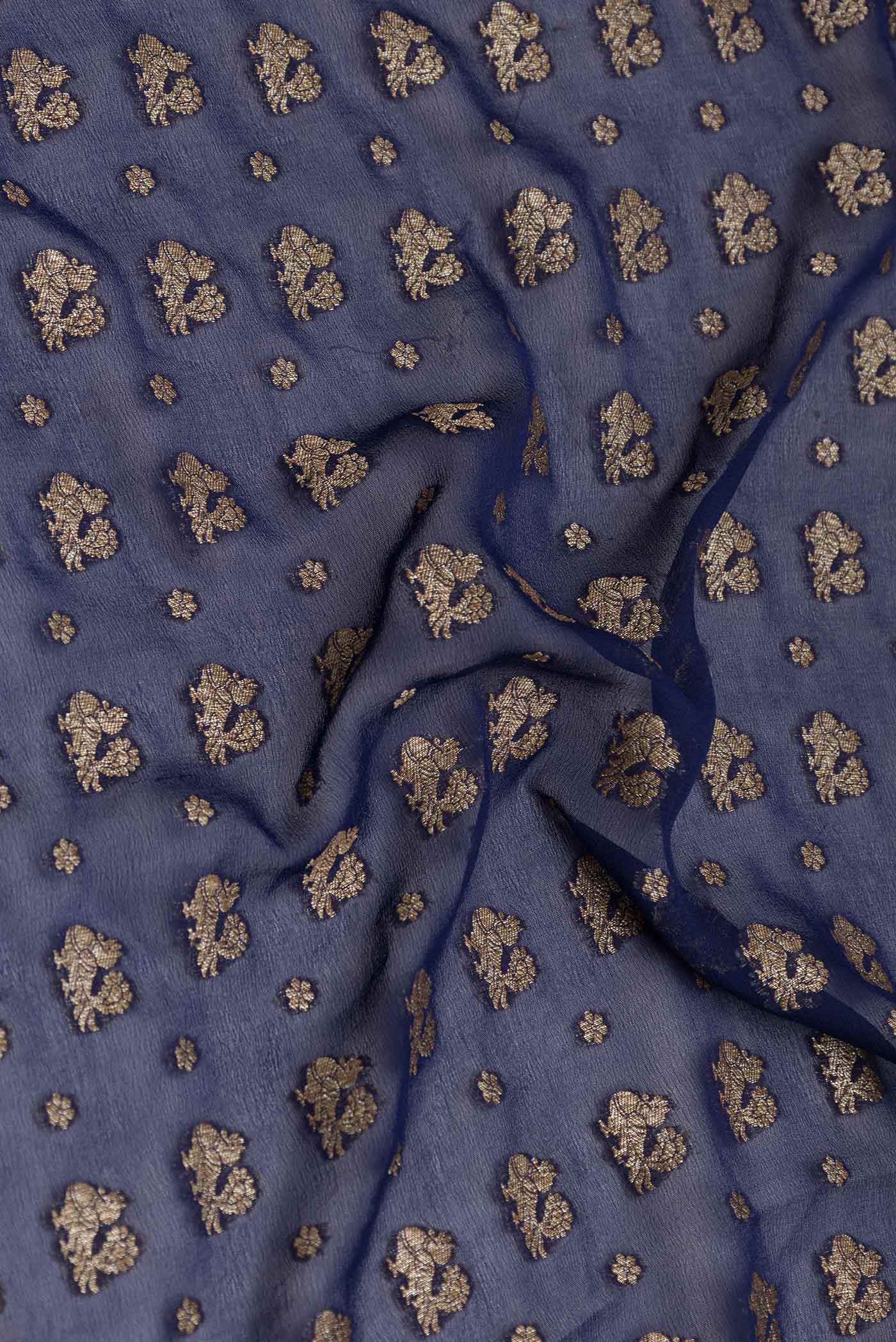Close up of Royal Blue Dual Tone Banarasi Georgette Saree with Zari Brocade on the body and Zari Border displaying folds