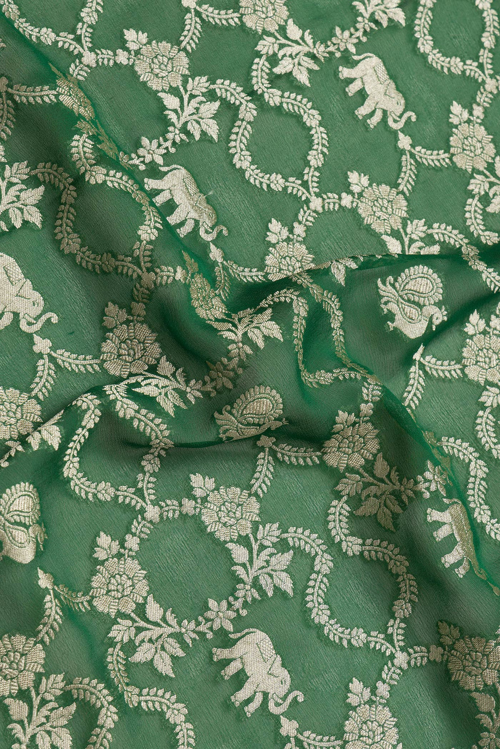 Close up of Bottle Green Dual Tone Mysore Georgette Saree with Zari Brocade on the body and Zari Border.  displaying folds