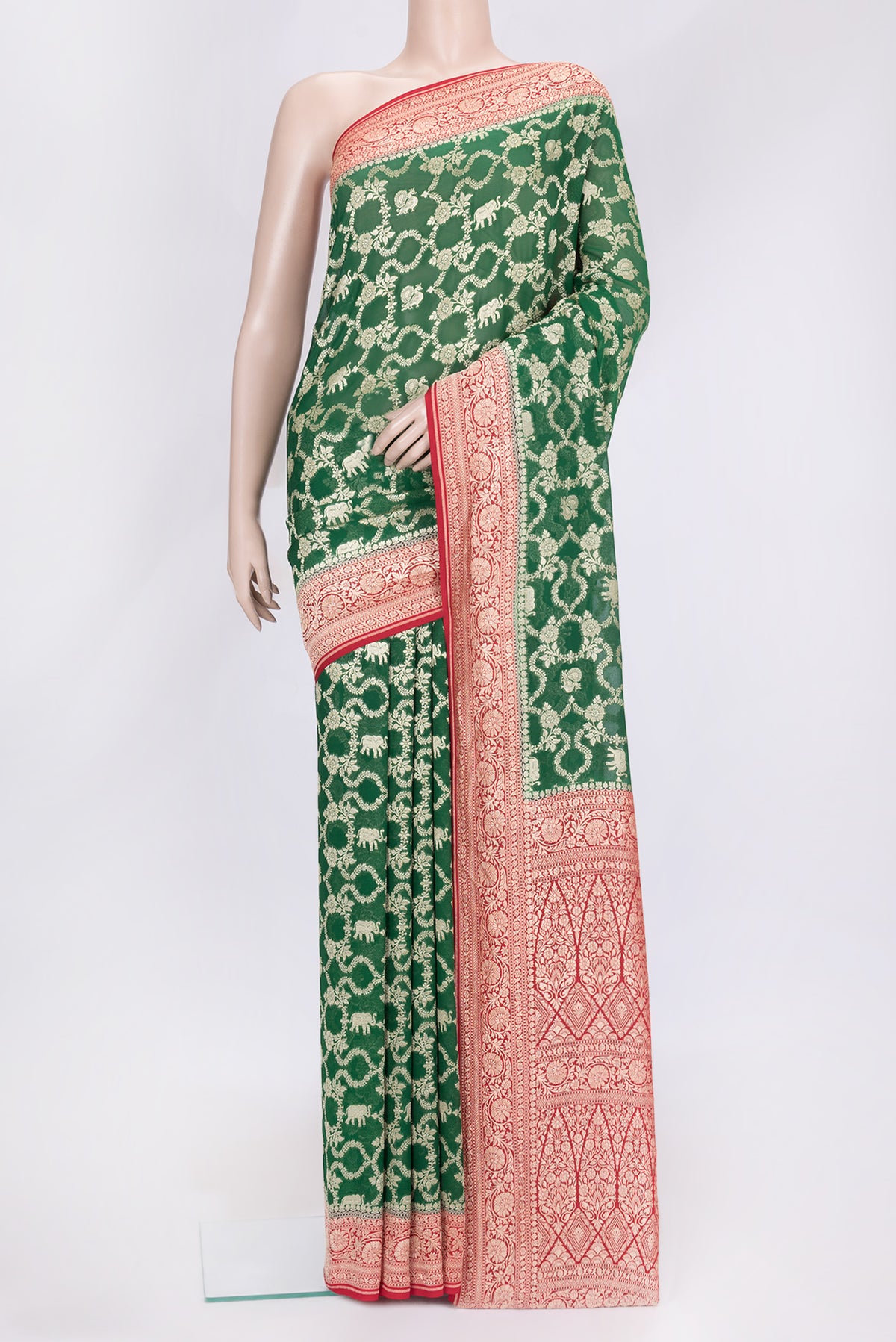 Bottle Green Dual Tone Mysore Georgette Saree with Zari Brocade on the body and Zari Border.  displayed on a mannequin
