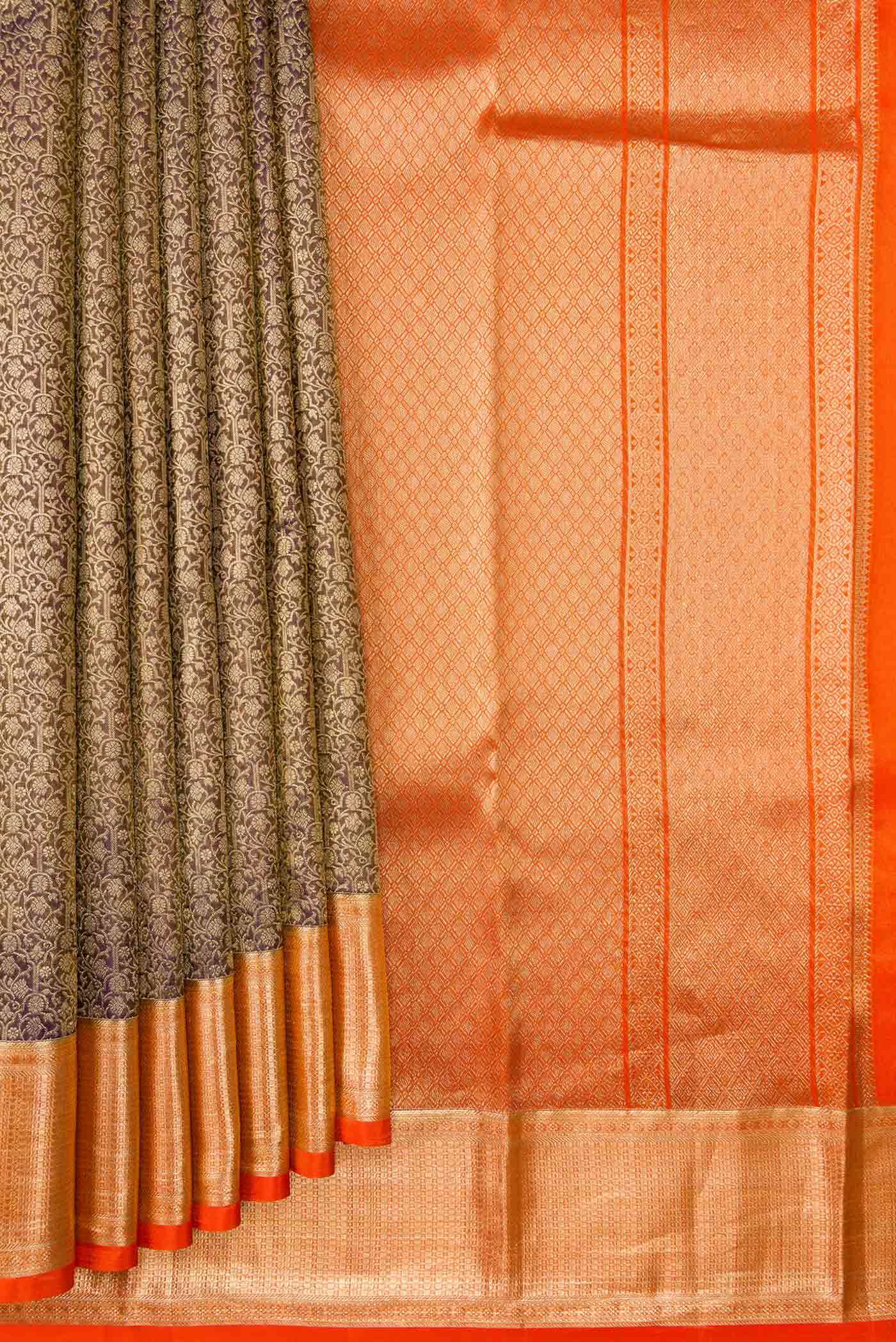 Pleats and pallu of Coffee Brown Dual Tone Kanchipuram Silk Saree with Zari Brocade on the body and Zari Border. 