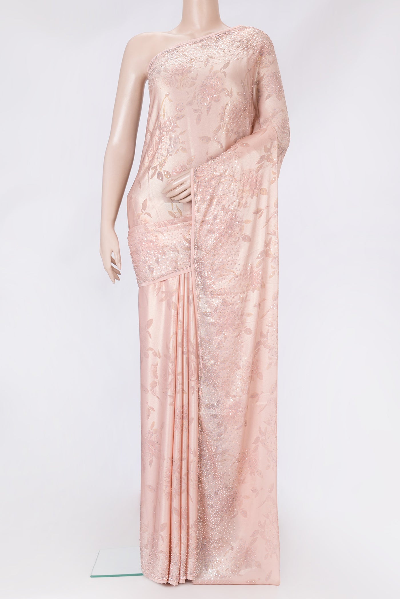 Rose Gold Dual Tone Georgette Saree with Embroidery on the body and Embroidery Border.  displayed on a mannequin