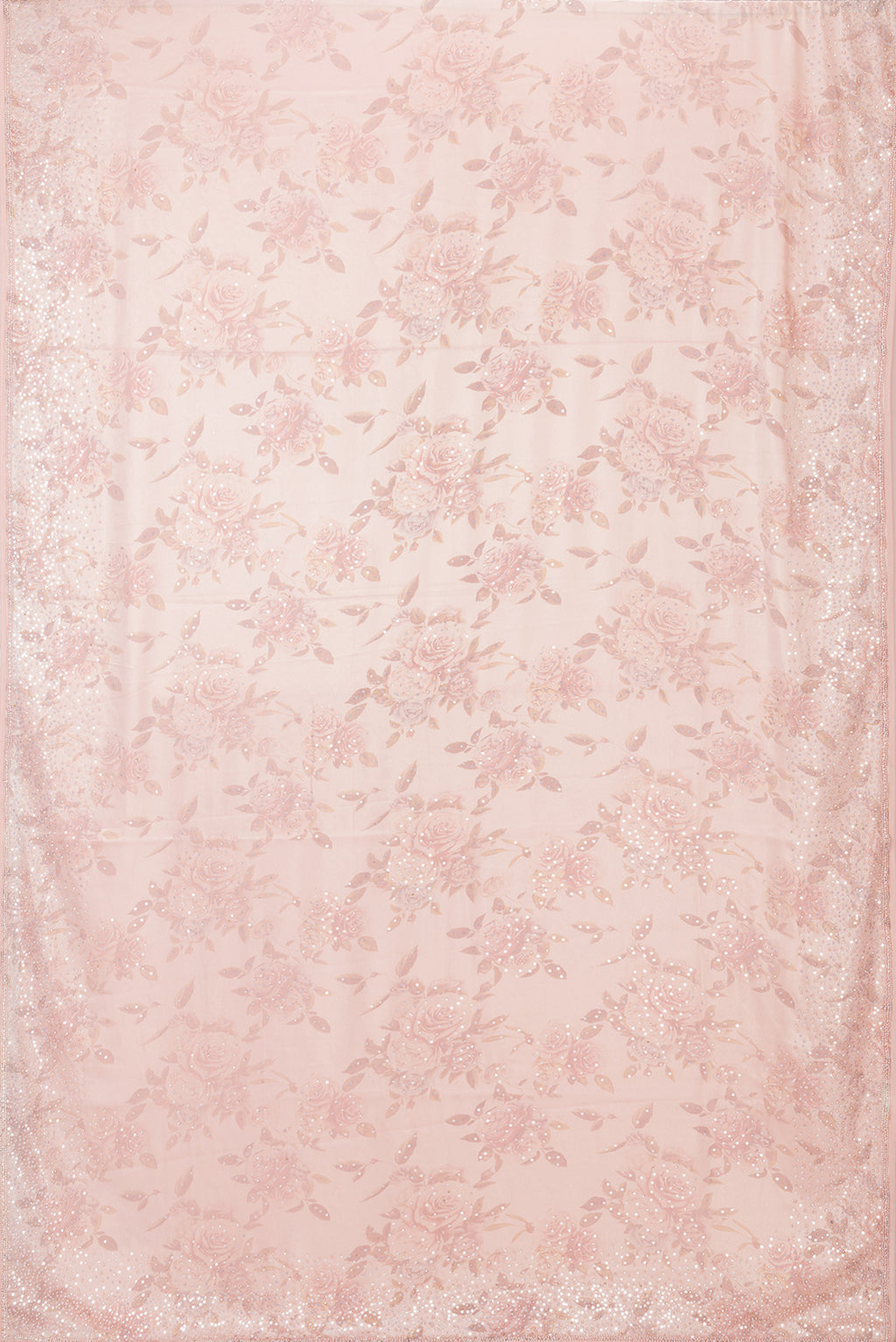 Flat view of Rose Gold Dual Tone Georgette Saree with Embroidery on the body and Embroidery Border. 
